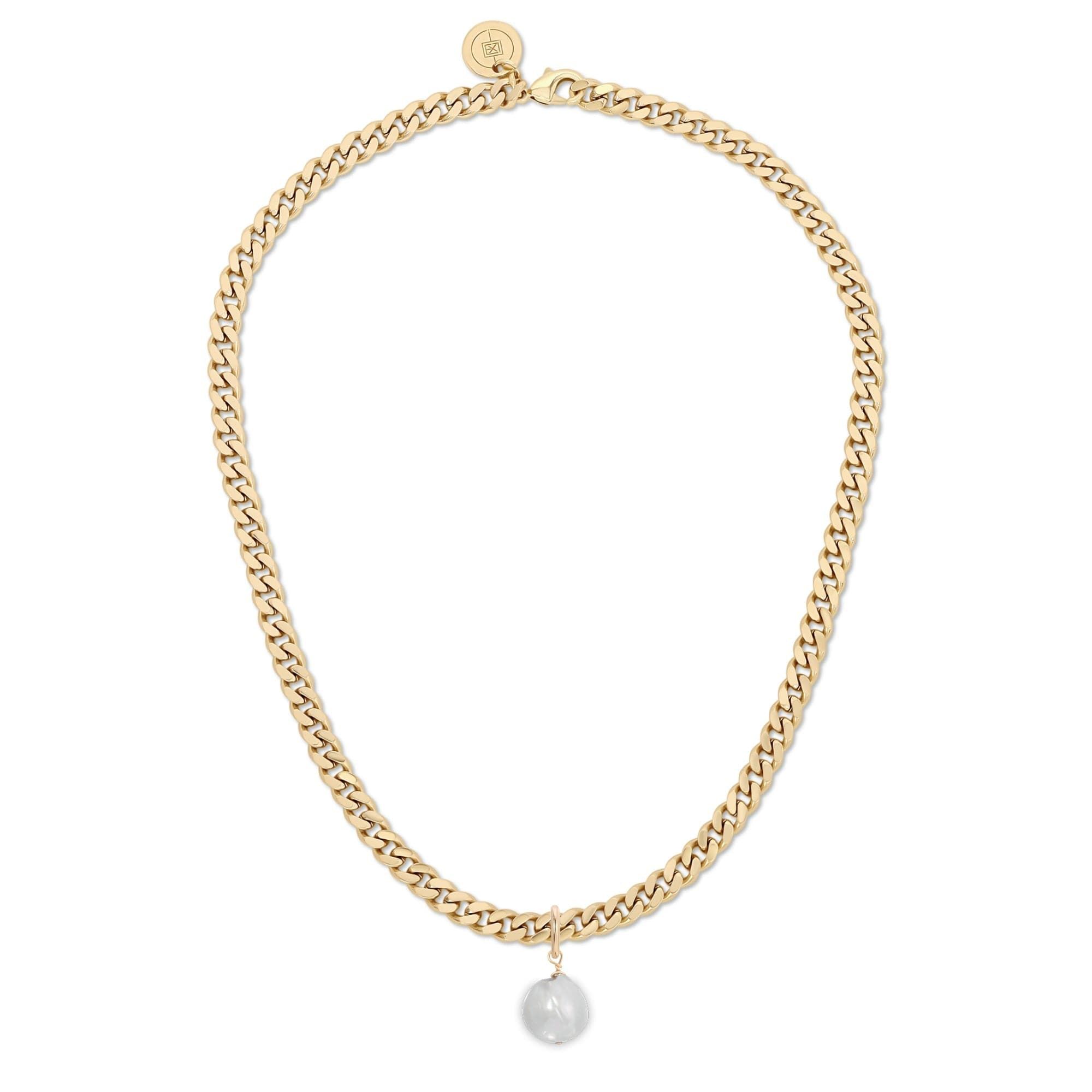 a gold chain necklace with a pearl charm
