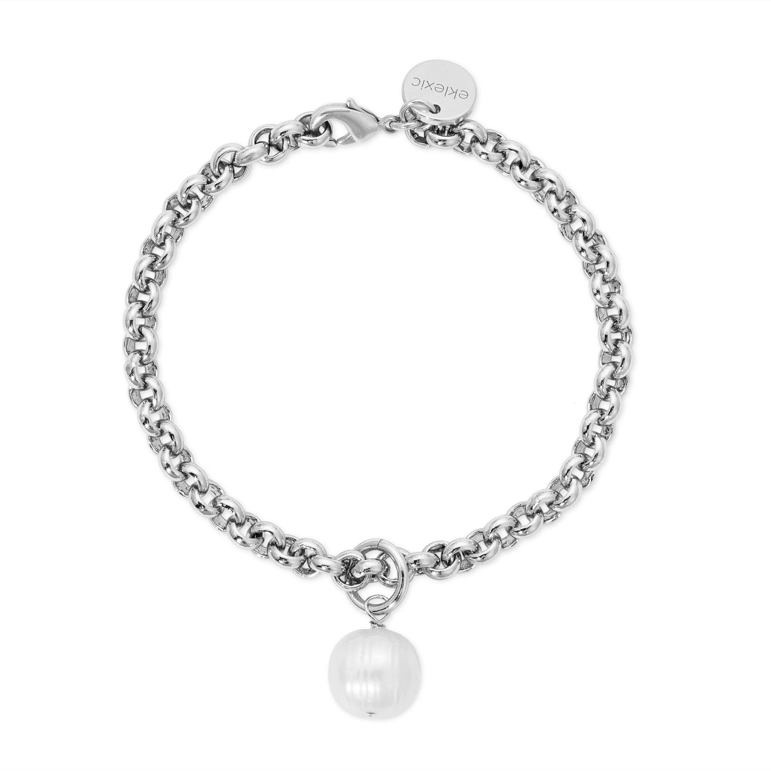 a silver bracelet with a round charm