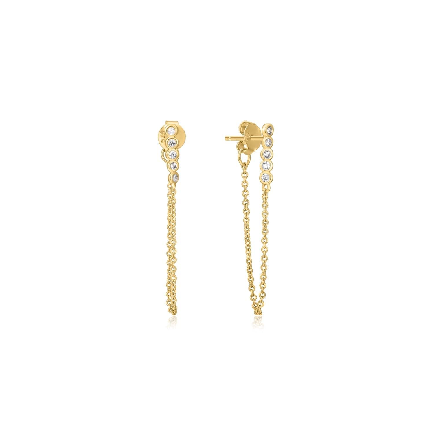 a pair of gold earrings with a chain