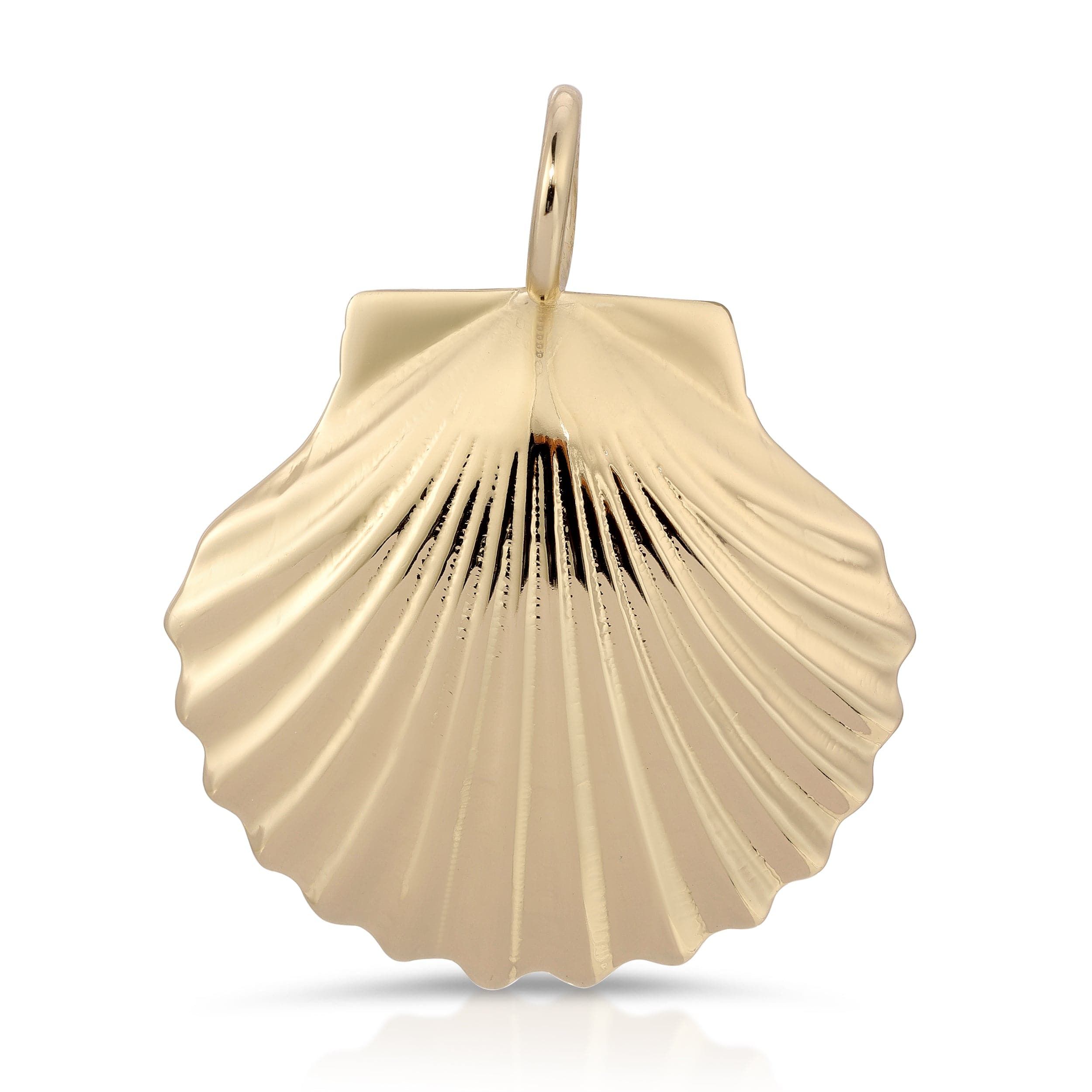 a gold scallop shell charm on a white background
