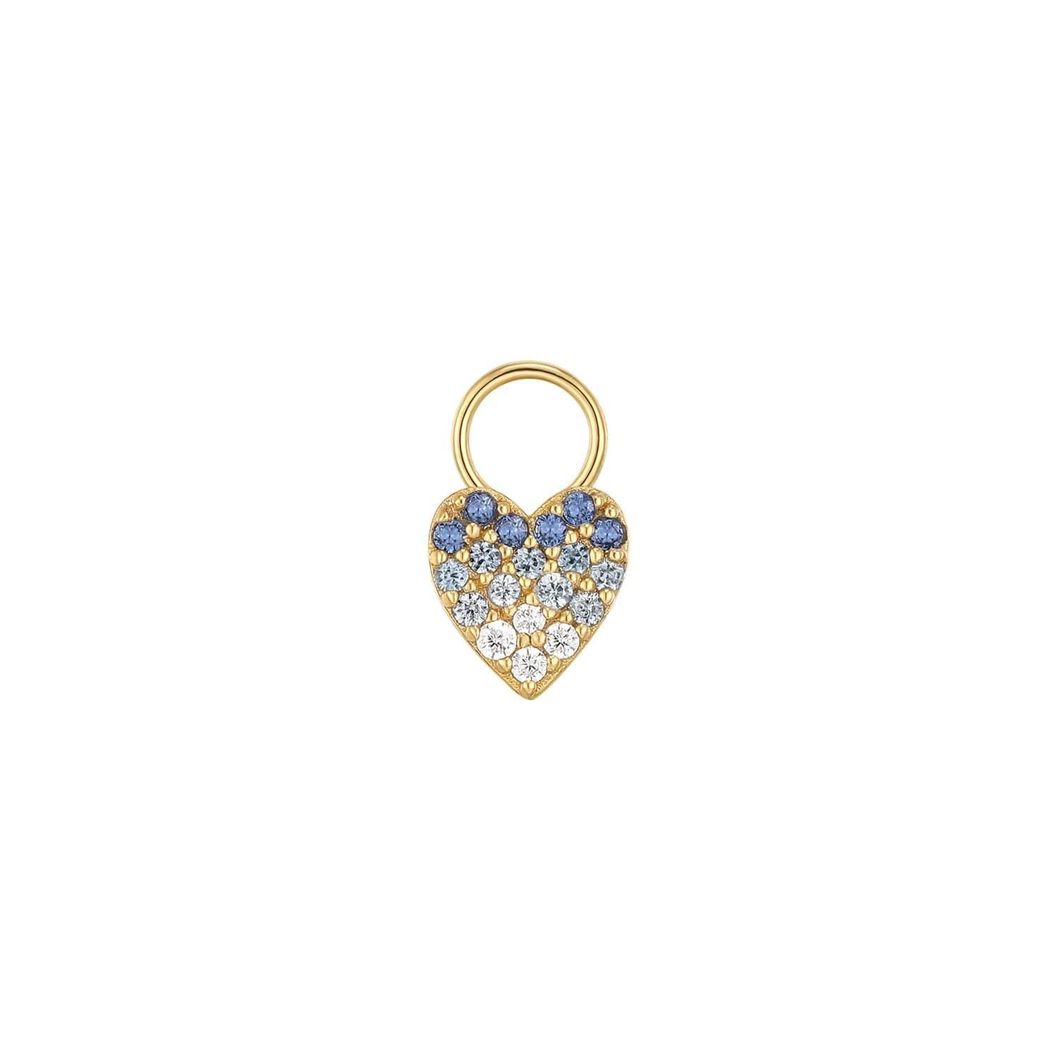 a gold heart shaped ring with blue and white stones