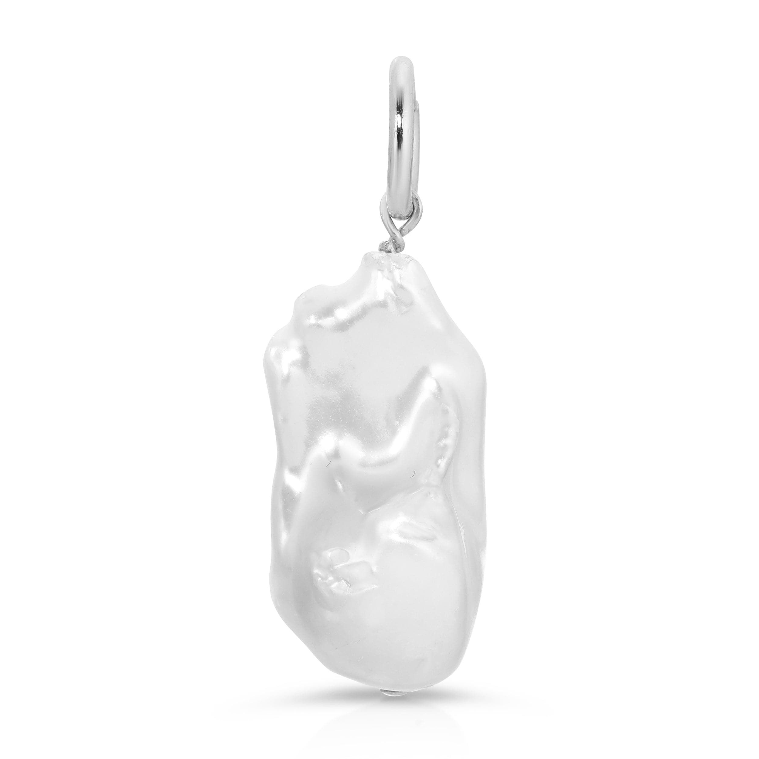 a white pendant with a bear on it