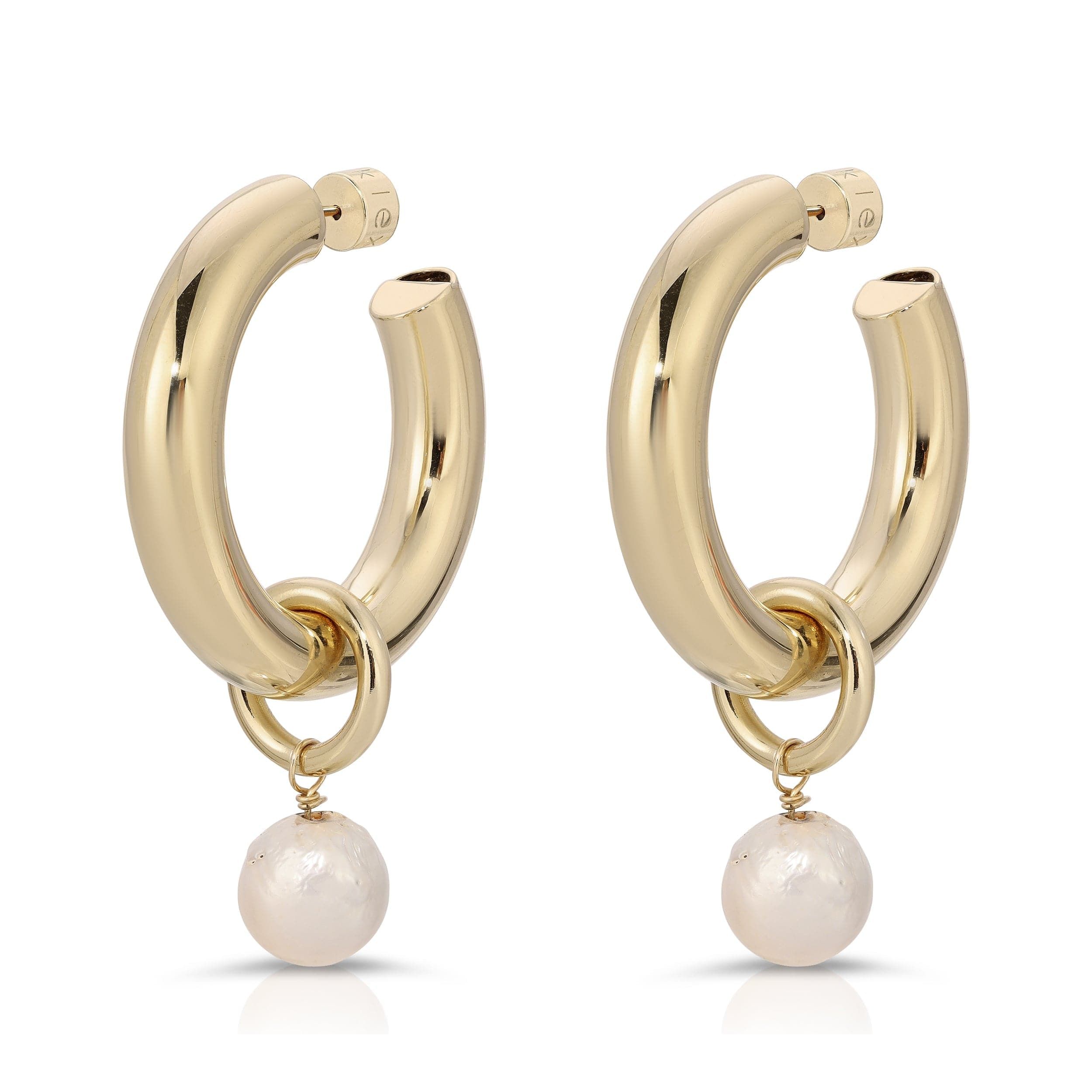 a pair of gold hoop earrings with a pearl