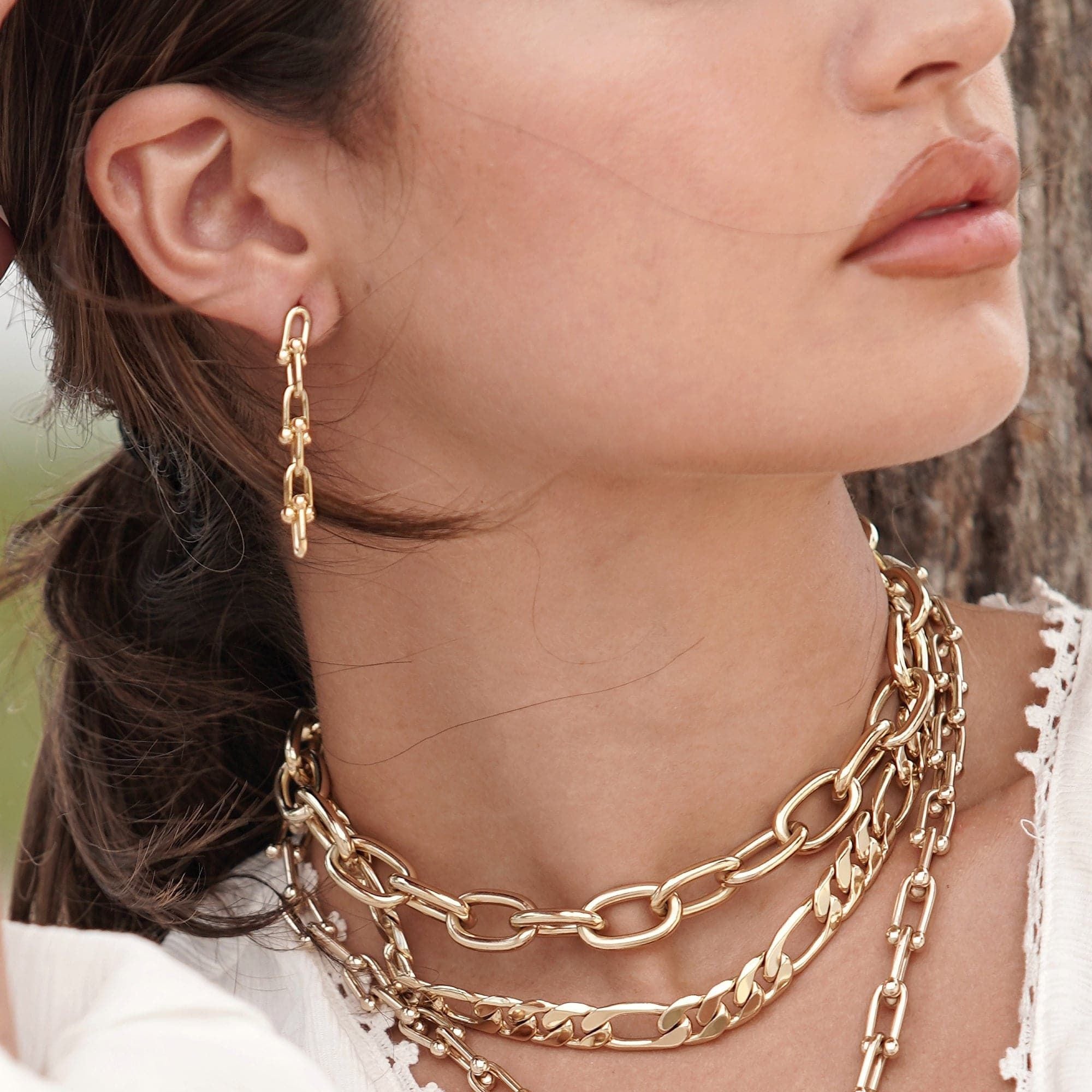 Gold chain jewelry set featuring the Alana Necklace with rounded link chain and lobster clasp