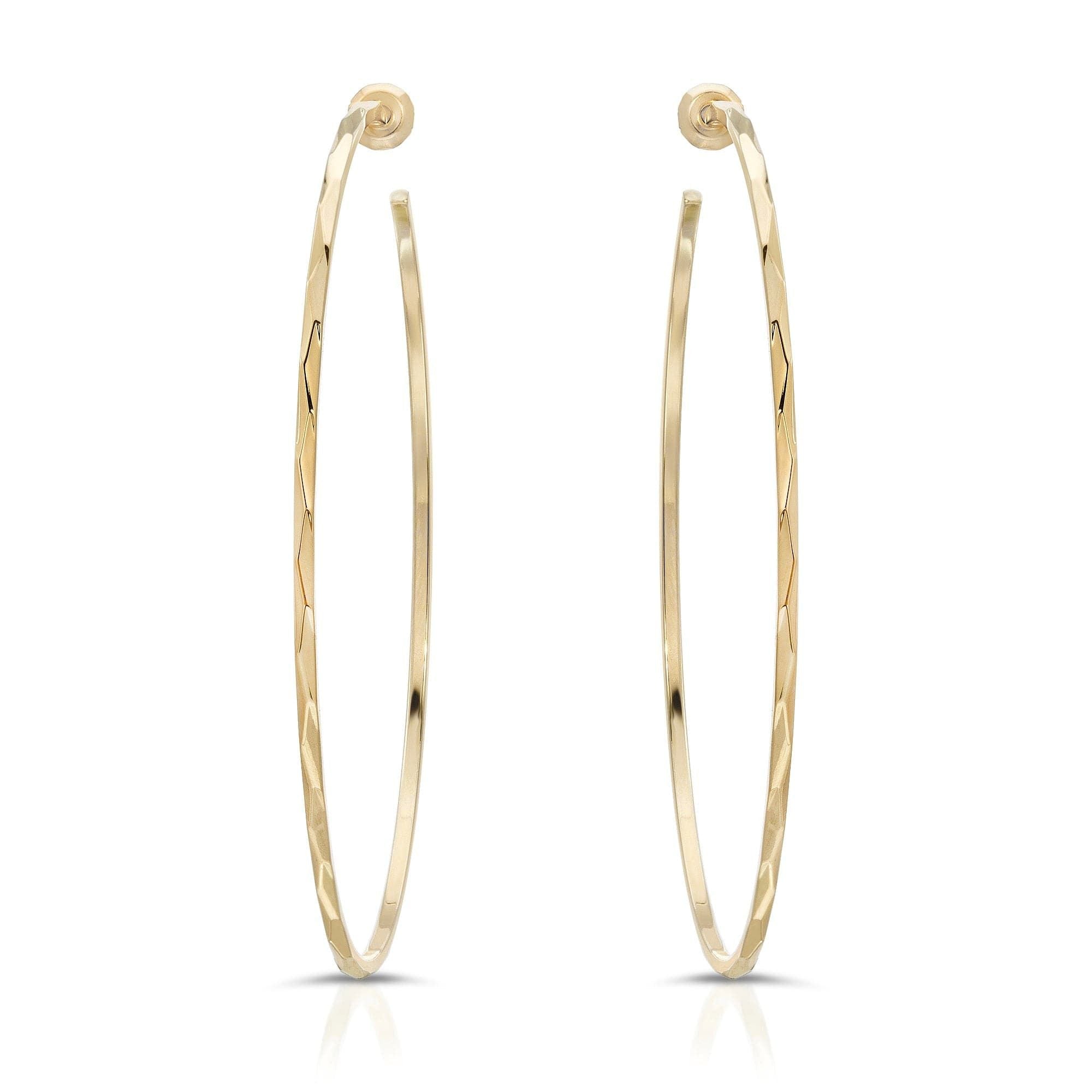 Gold hoop earrings named Avery Hoops, made from recycled brass, hoop measures perfect size