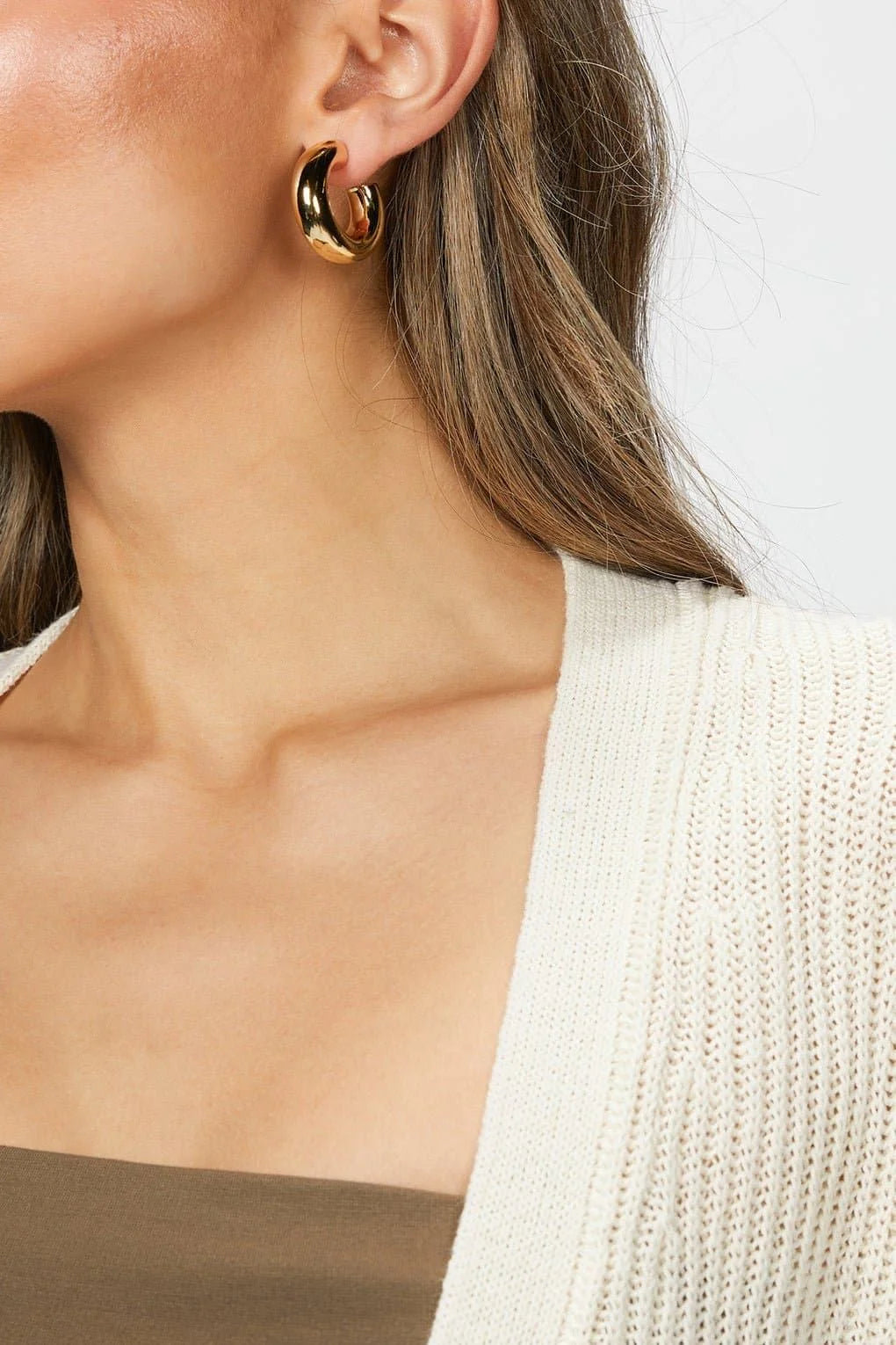 Gold hoop earring from Baby Ryan Hoops collection perfect for any style feel good vibe