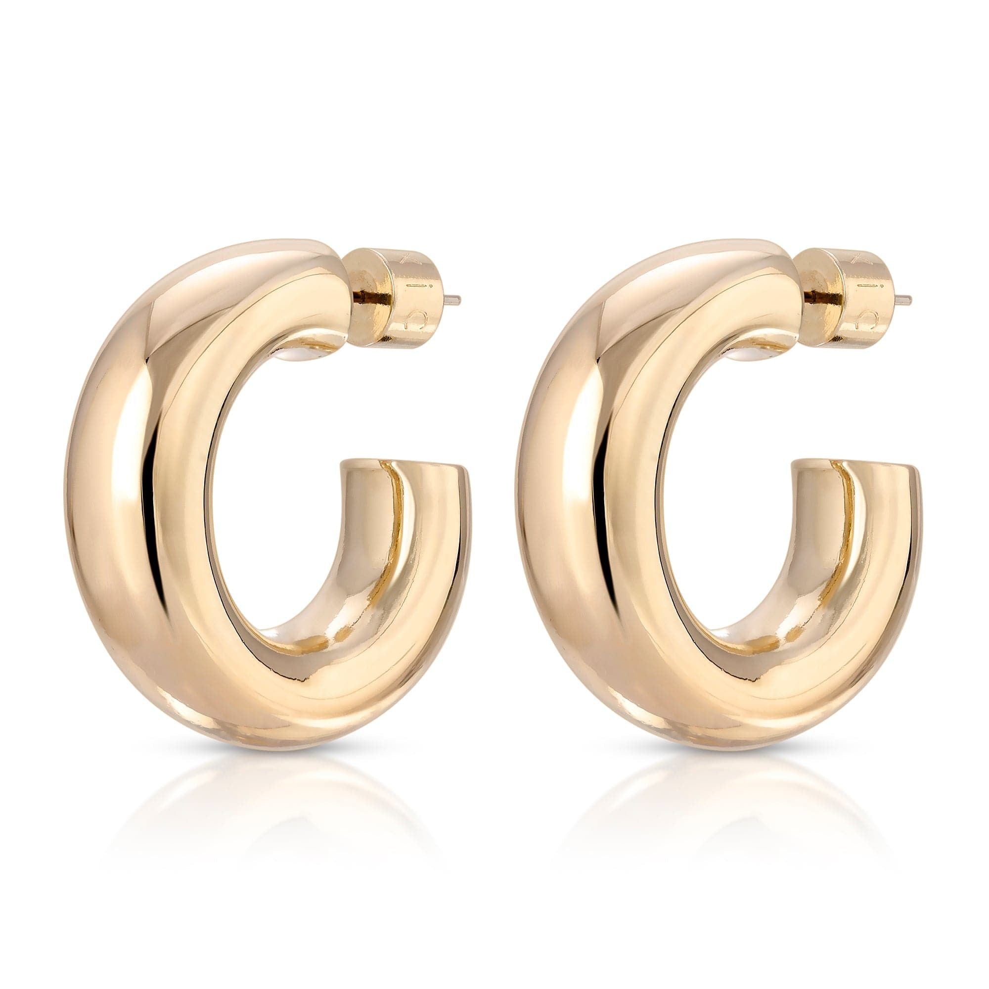 Pair of Baby Ryan Hoops in gold, made with recycled brass hollow and hypoallergenic steel