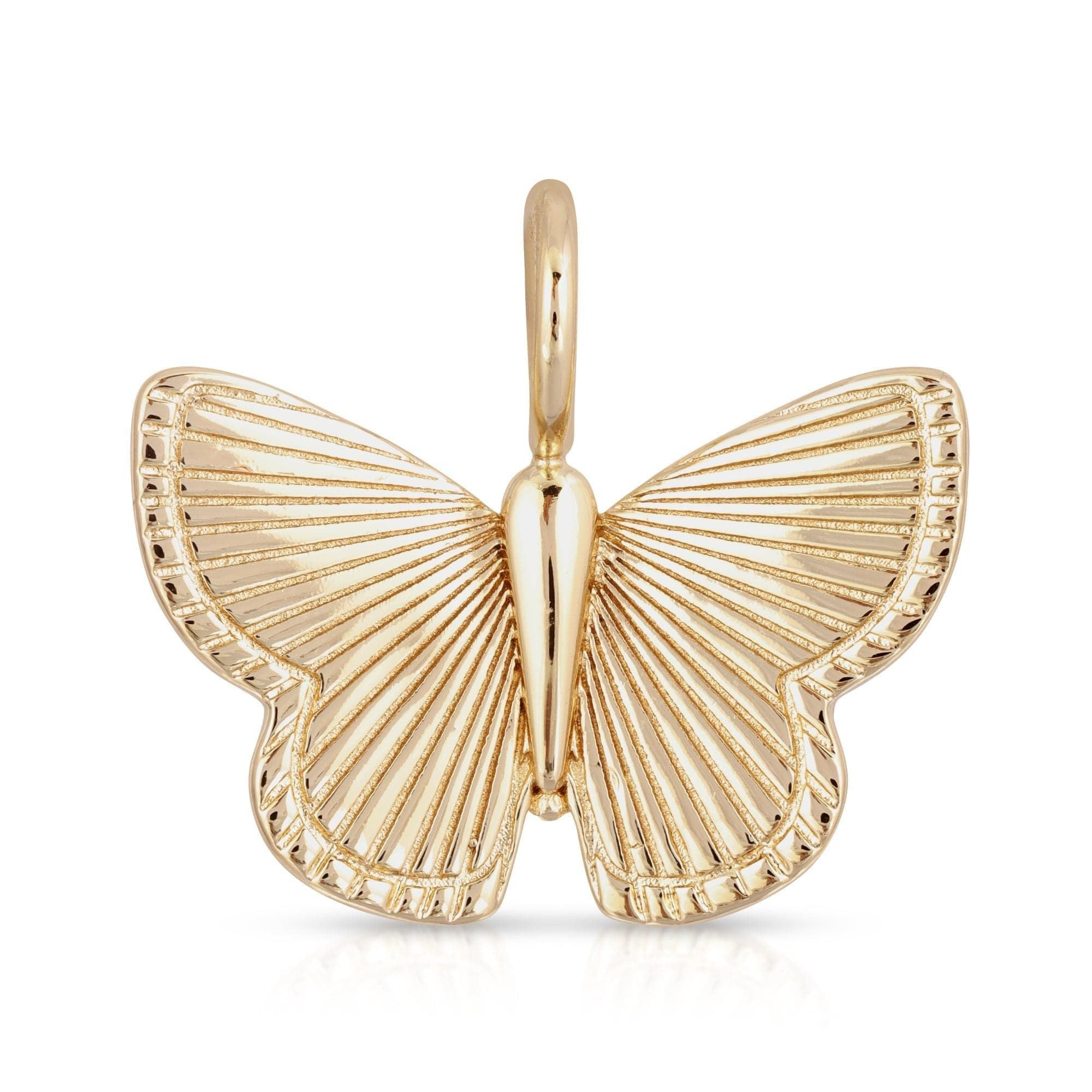 Gold butterfly pendant from Beatrix Pendant, crafted in recycled brass plated 14k