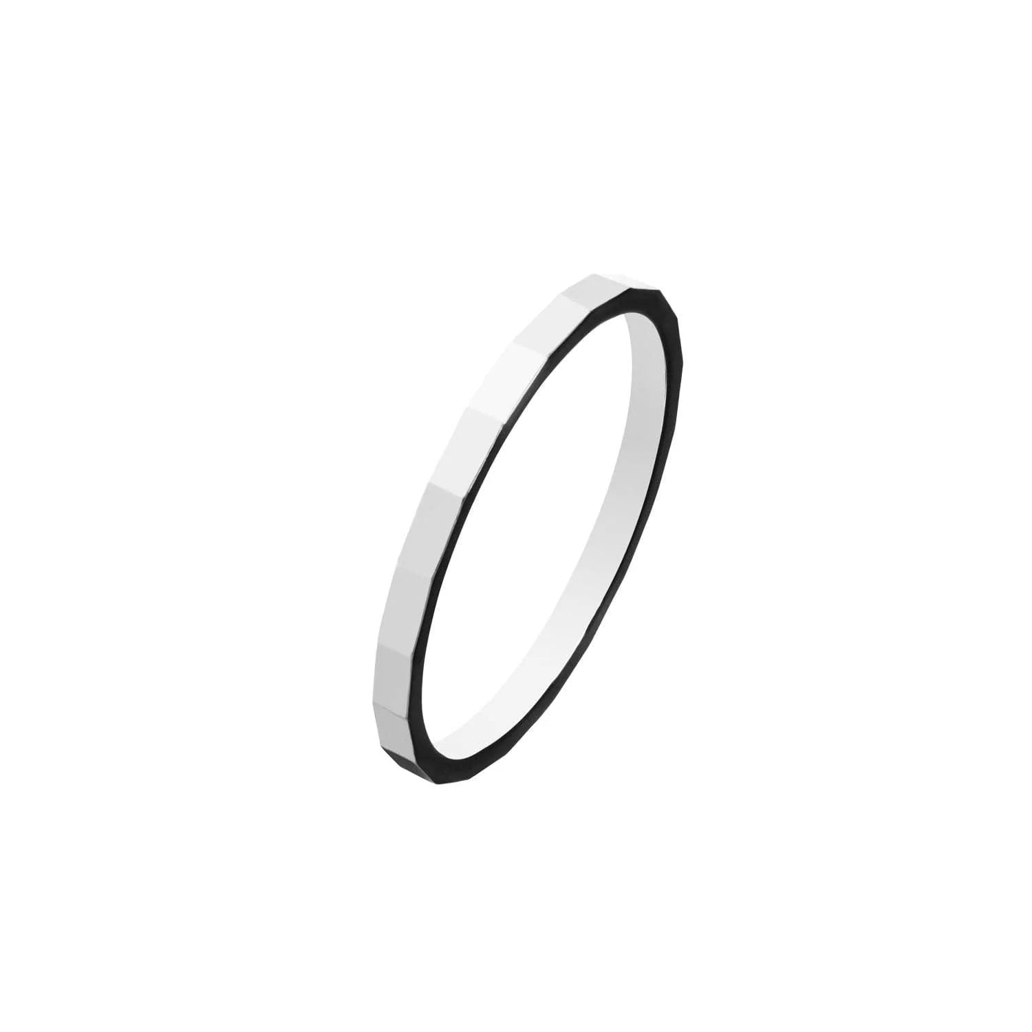 White and black ring displayed in Bianca Ring, crafted from 14k yellow gold