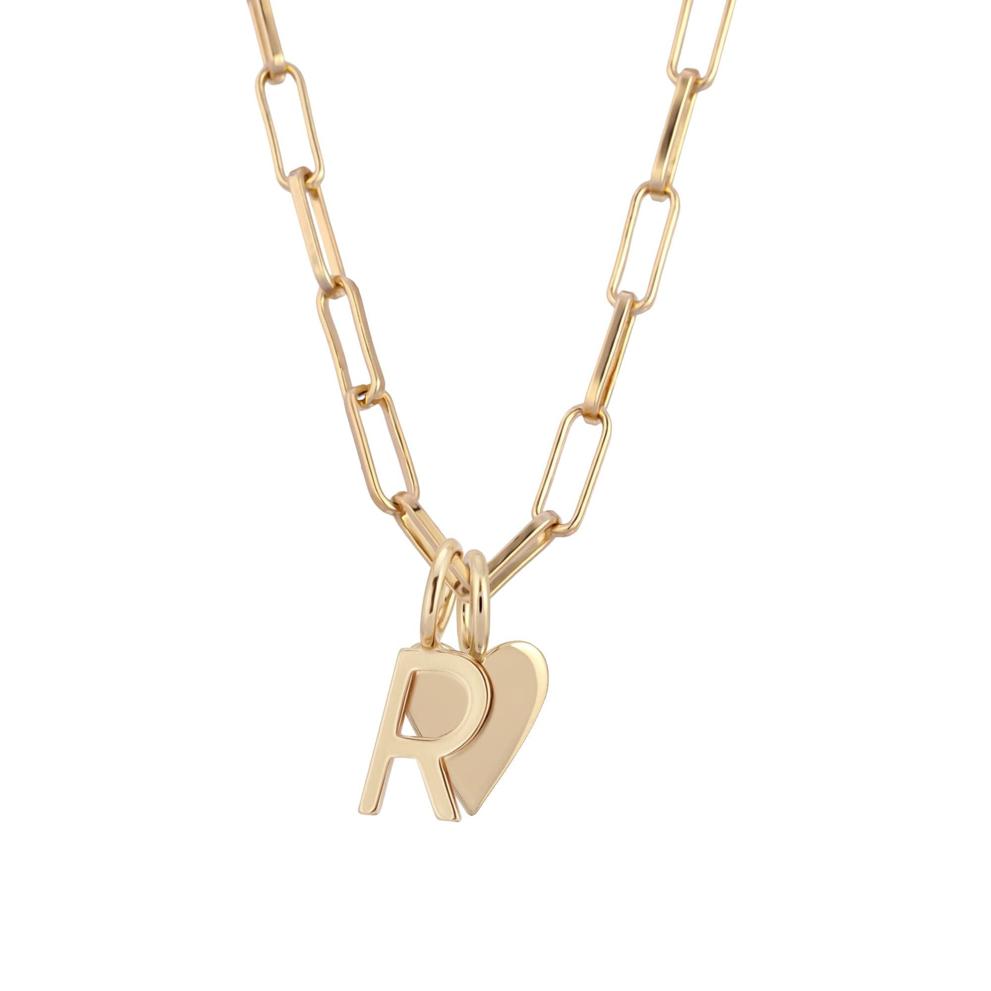 Gold chain Cara Charm Necklace featuring letter R and heart pendants on elongated link chain