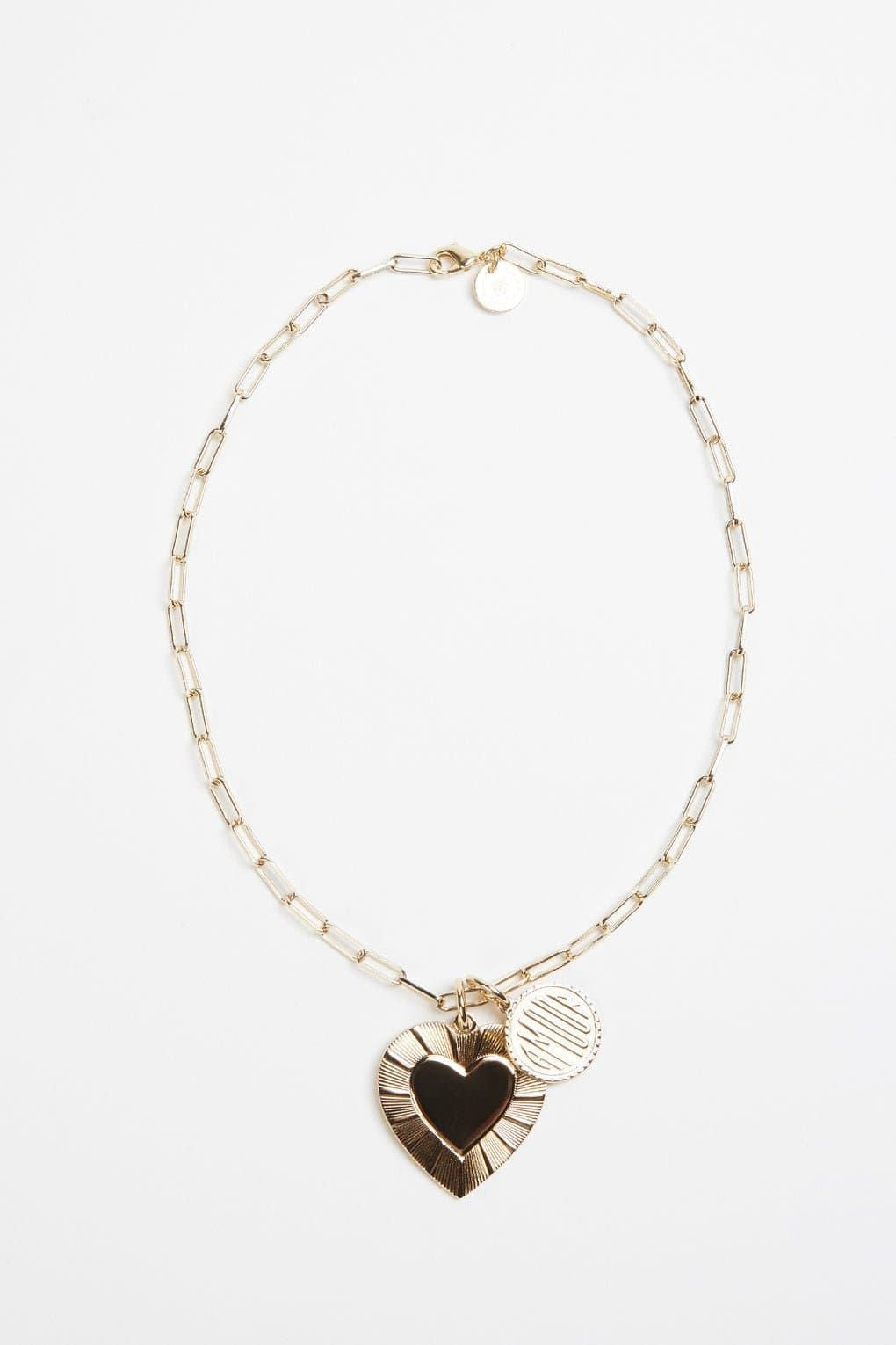 Gold chain Catalina Charm Necklace featuring heart and coin pendants