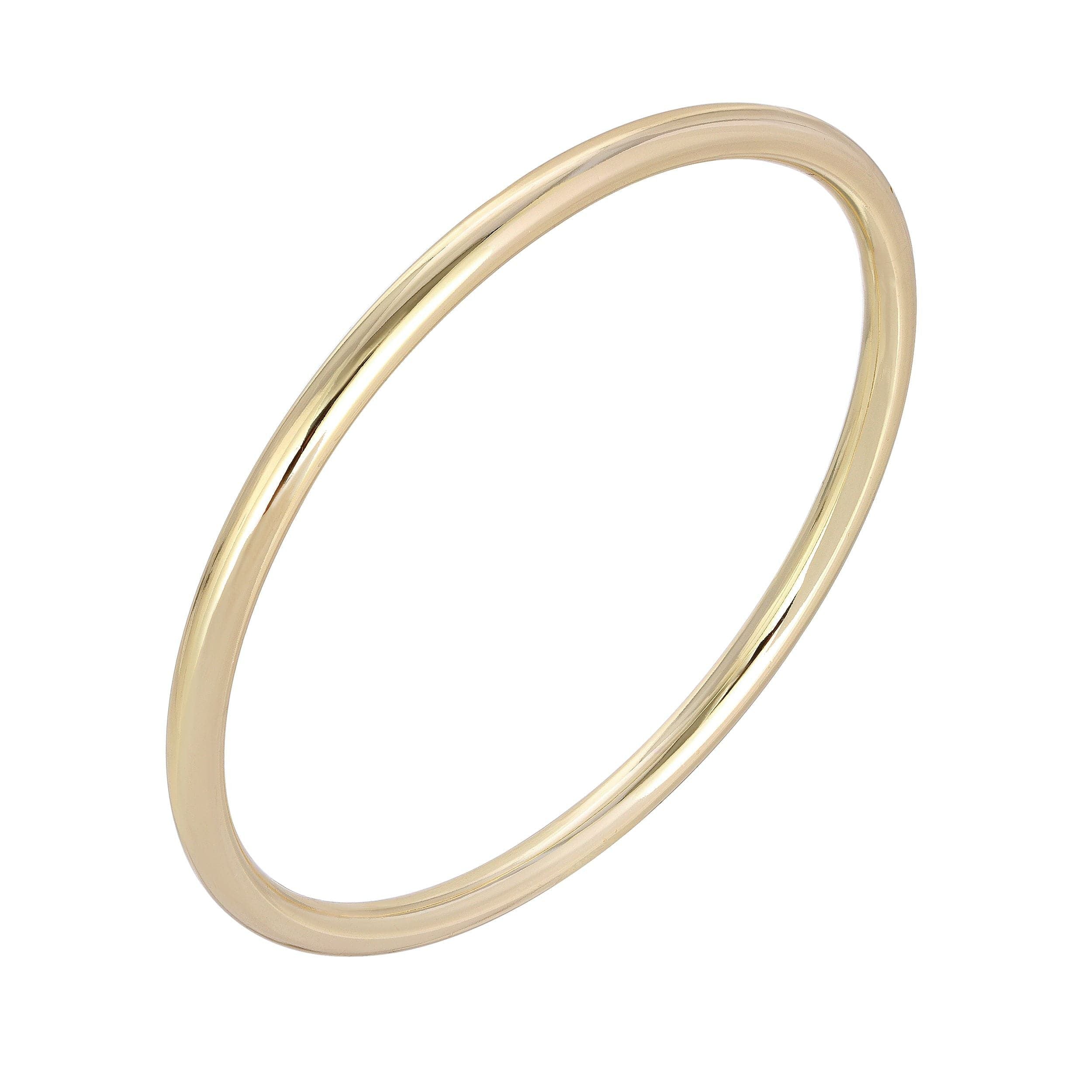 Simple gold ring from a Classic Bangle Set, showcasing timeless elegance