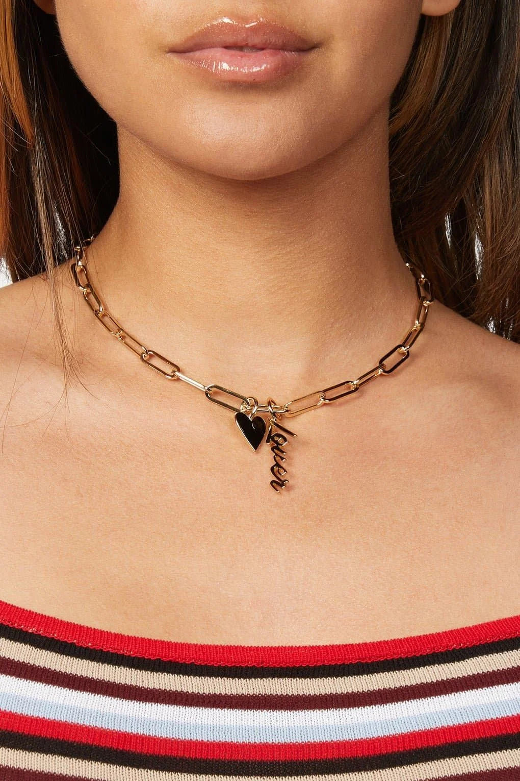 Gold chain necklace with heart and lover charms featuring custom script name pendant