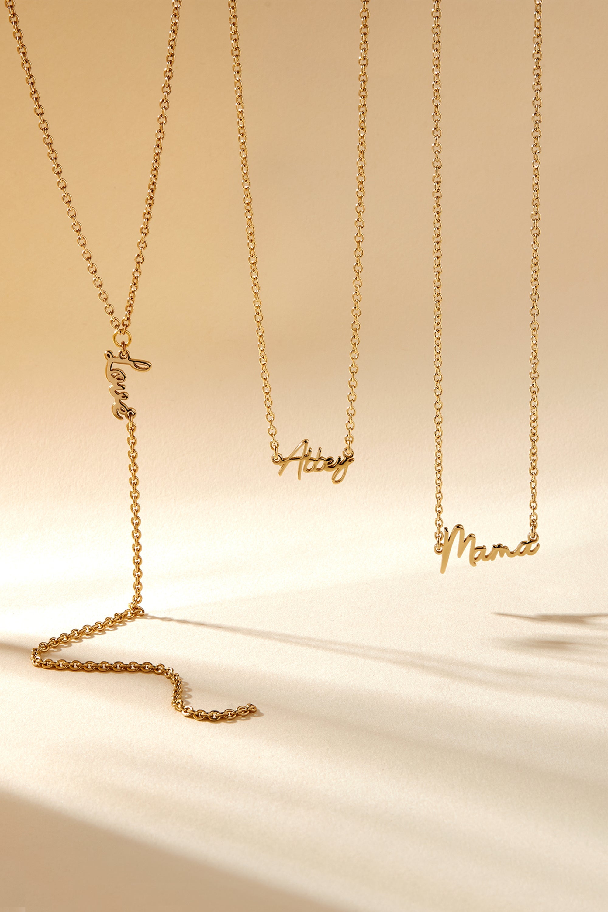 Gold Dainty Script Love Lariat Necklace showcasing elegant nameplate design