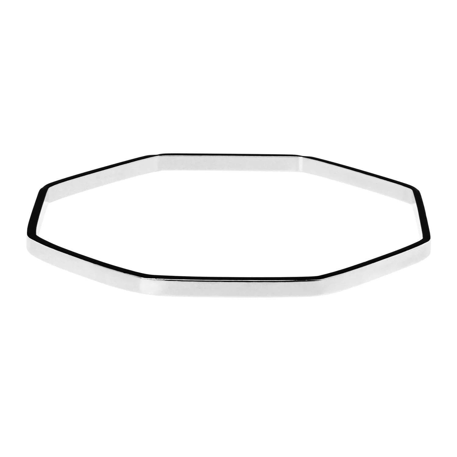Octagon shaped silver bangle from Jerry Bangle collection featuring 14k yellow accents
