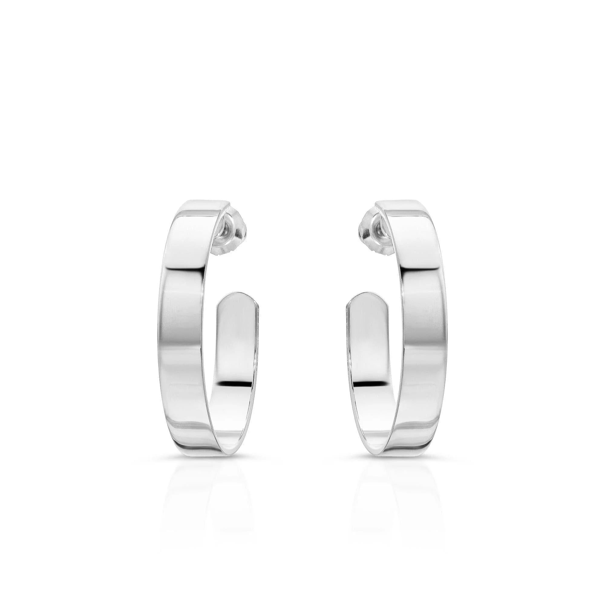 Shiny silver hoop earrings named 1 Isla Hoops showing a cute pair of 1-inch hoops