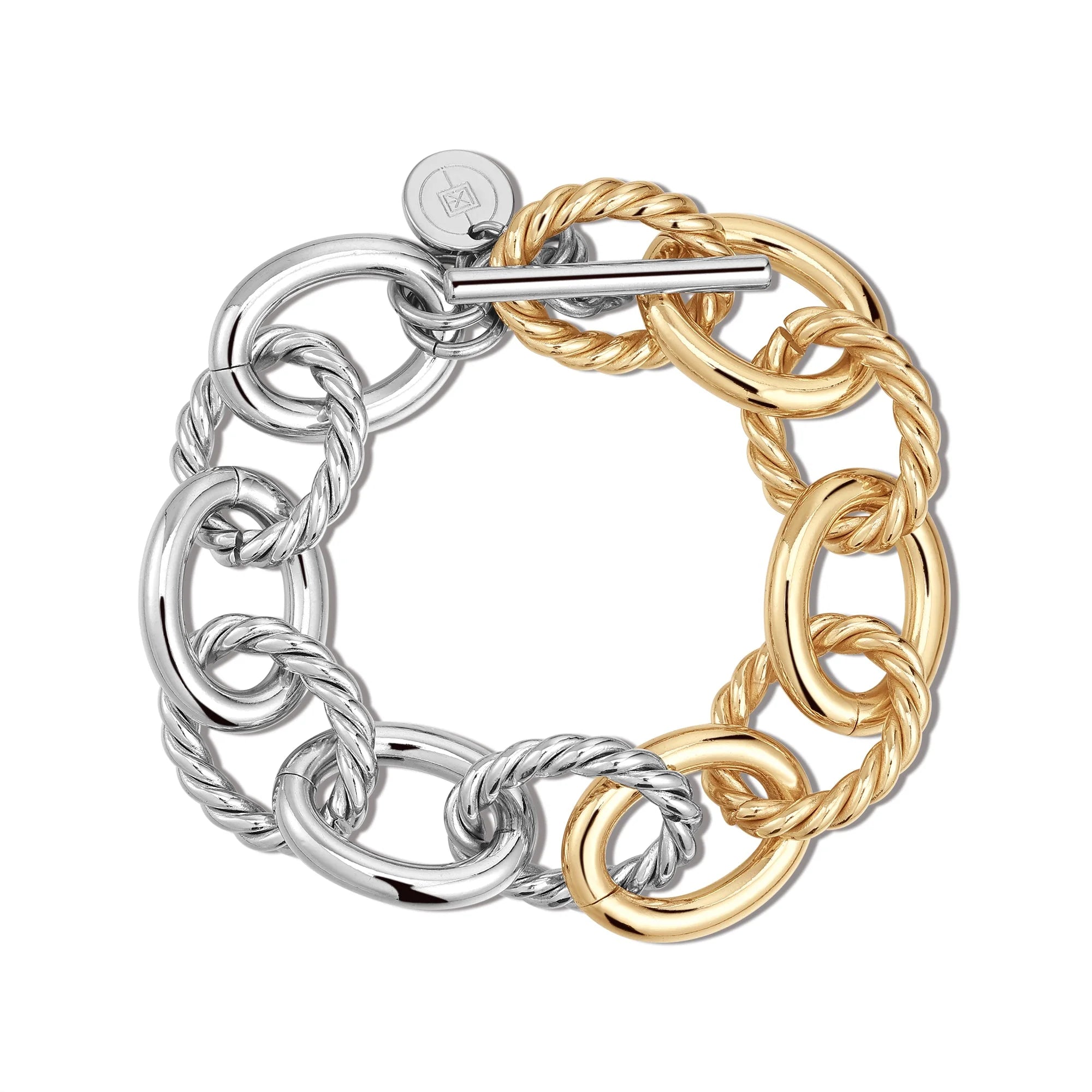 Two-tone XL alternating twisted link toggle bracelet in stylish jewelry display