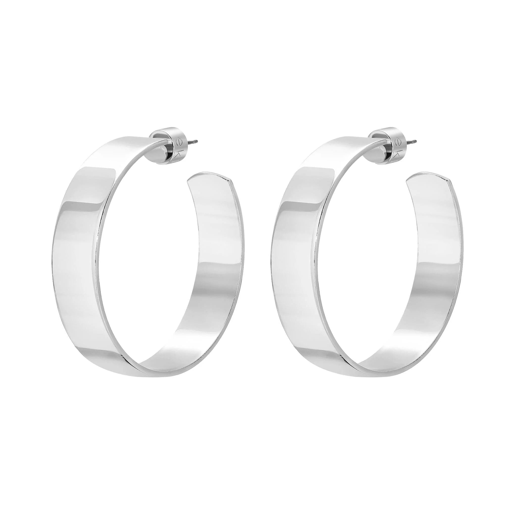Silver hoop earrings called 1.5 Skylar Hoops perfect for everyday wear