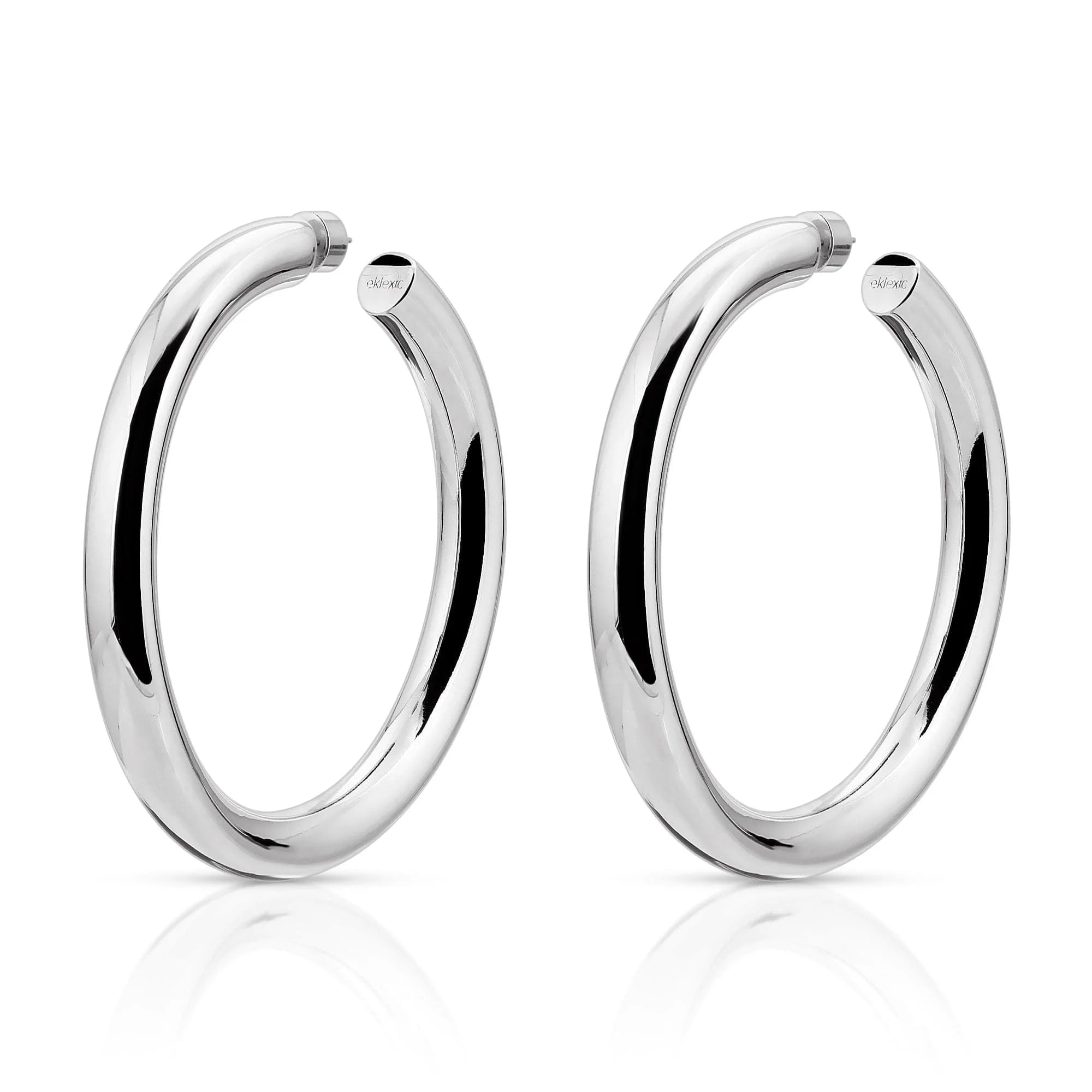 Shiny silver hoop earrings showing off the 2 inch Ryan Hoops style