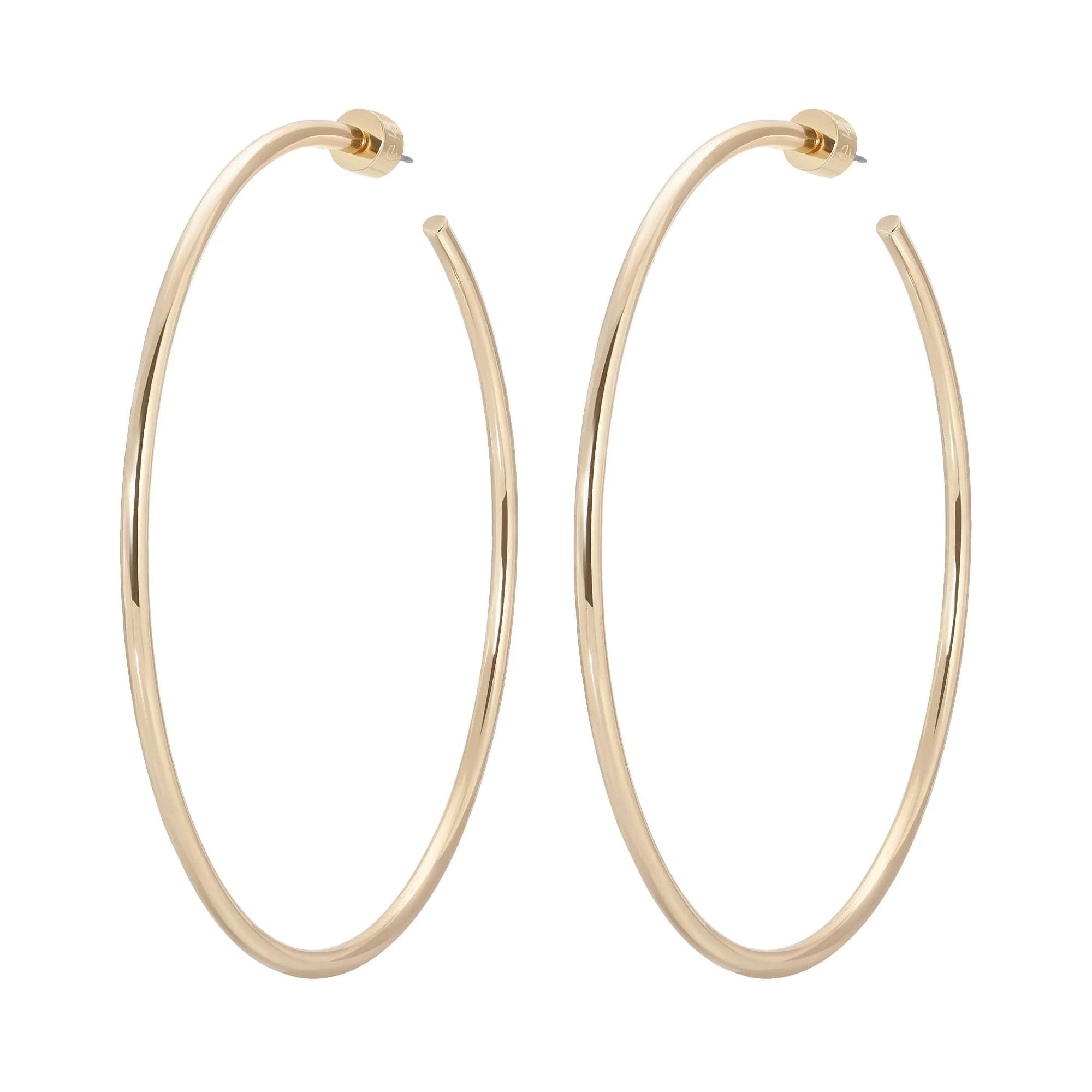 Gold hoop earrings from the 3 Inch Ultimate Hoops collection looking shiny and stylish