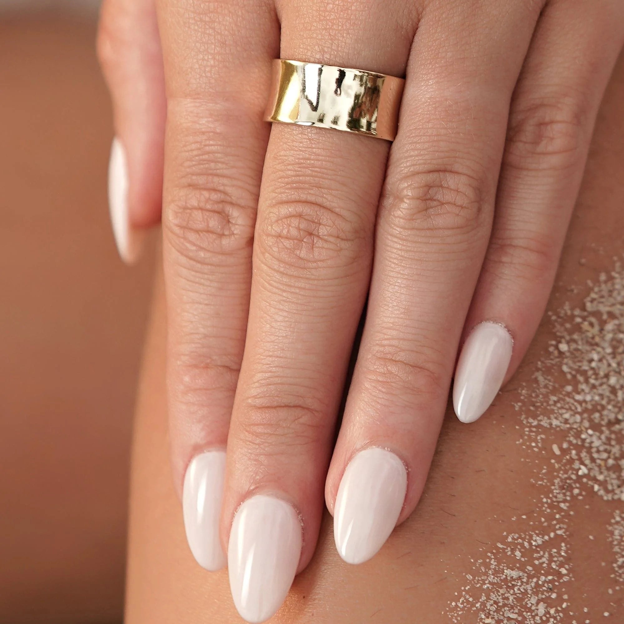 Gold hammered ring from Large Olivia Ring collection showing shiny textured surface
