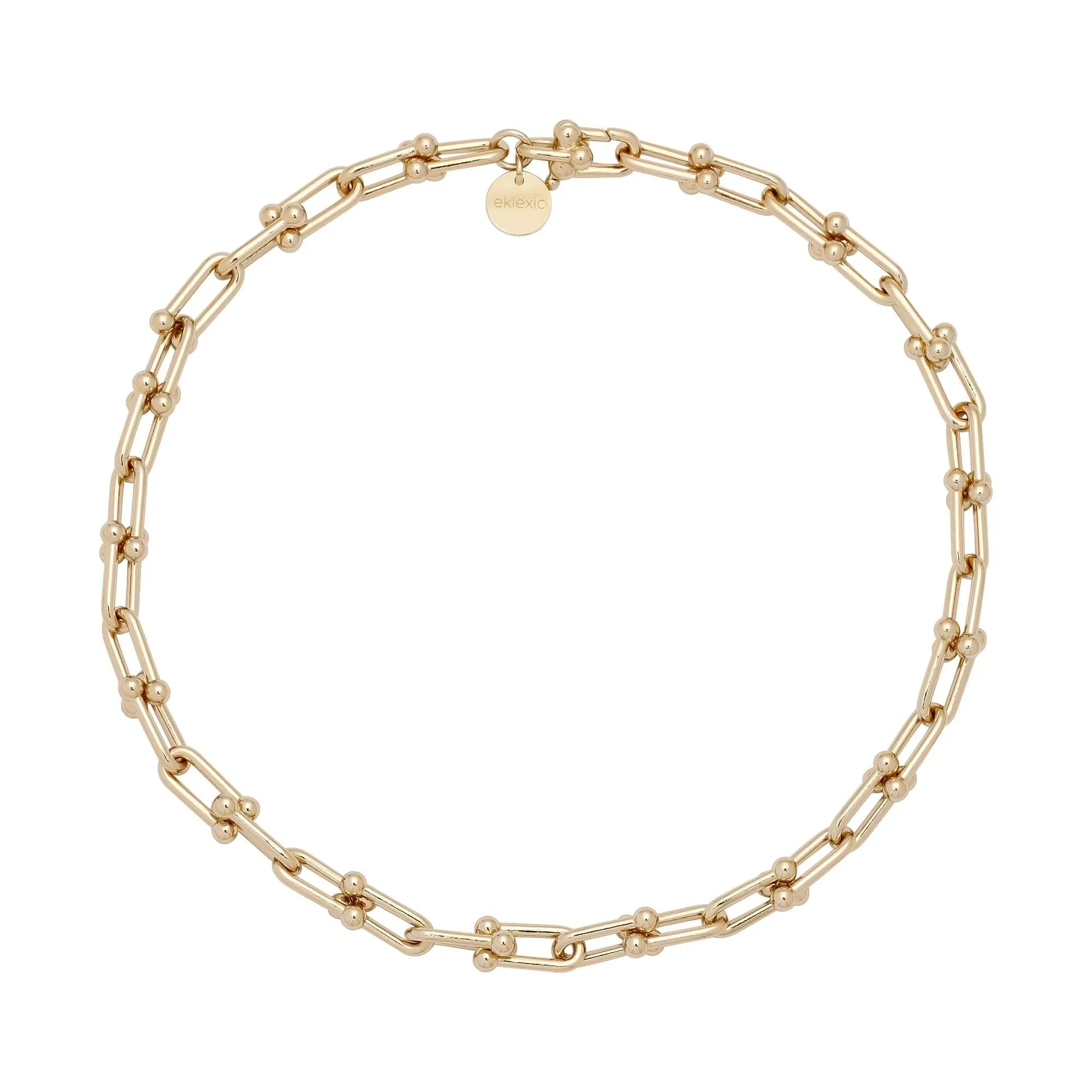 Gold chain-link necklace with circular charm from Margaux Necklace collection
