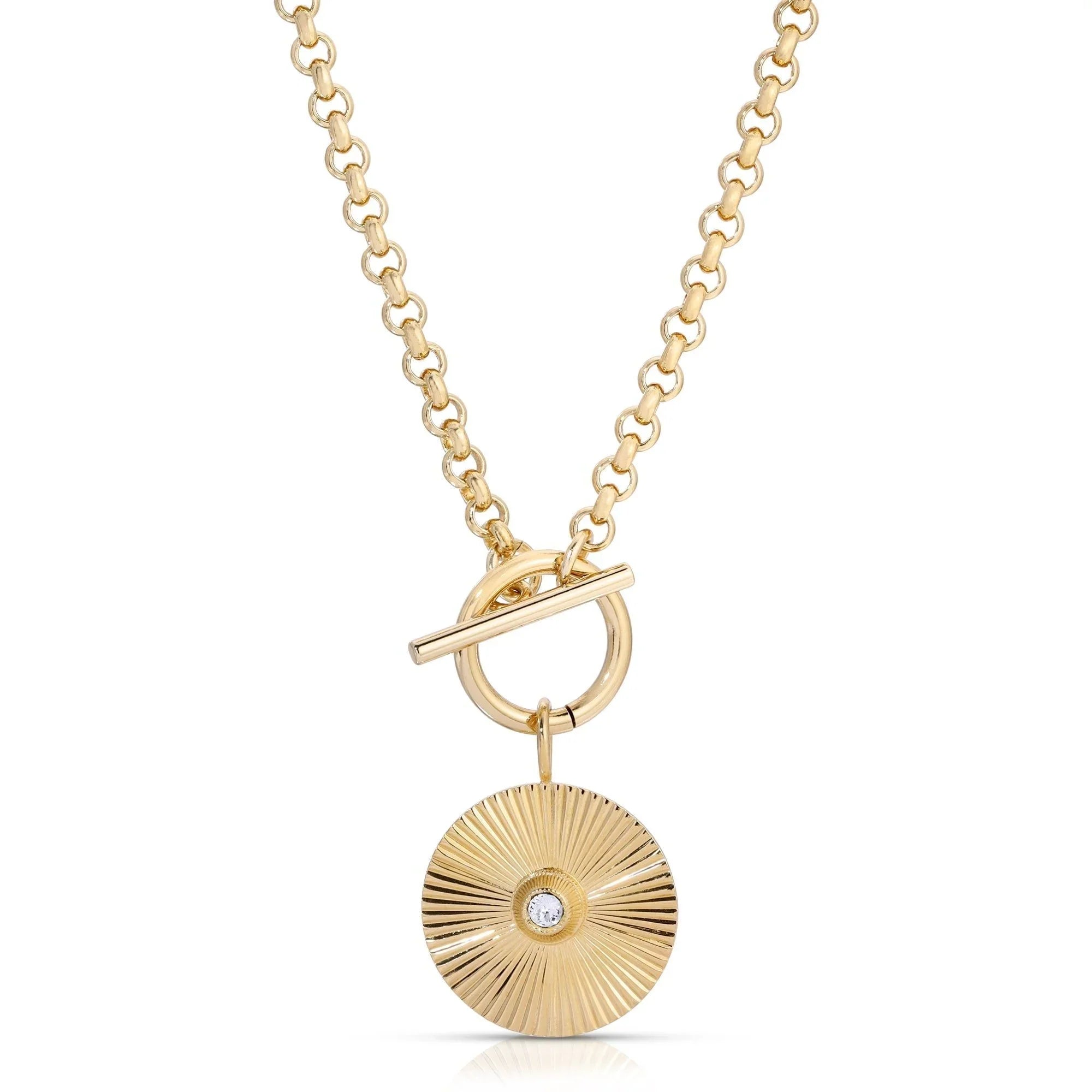 Gold chain necklace featuring a sunburst pendant from Micro Royal Toggle & Ocean Pendant Necklace