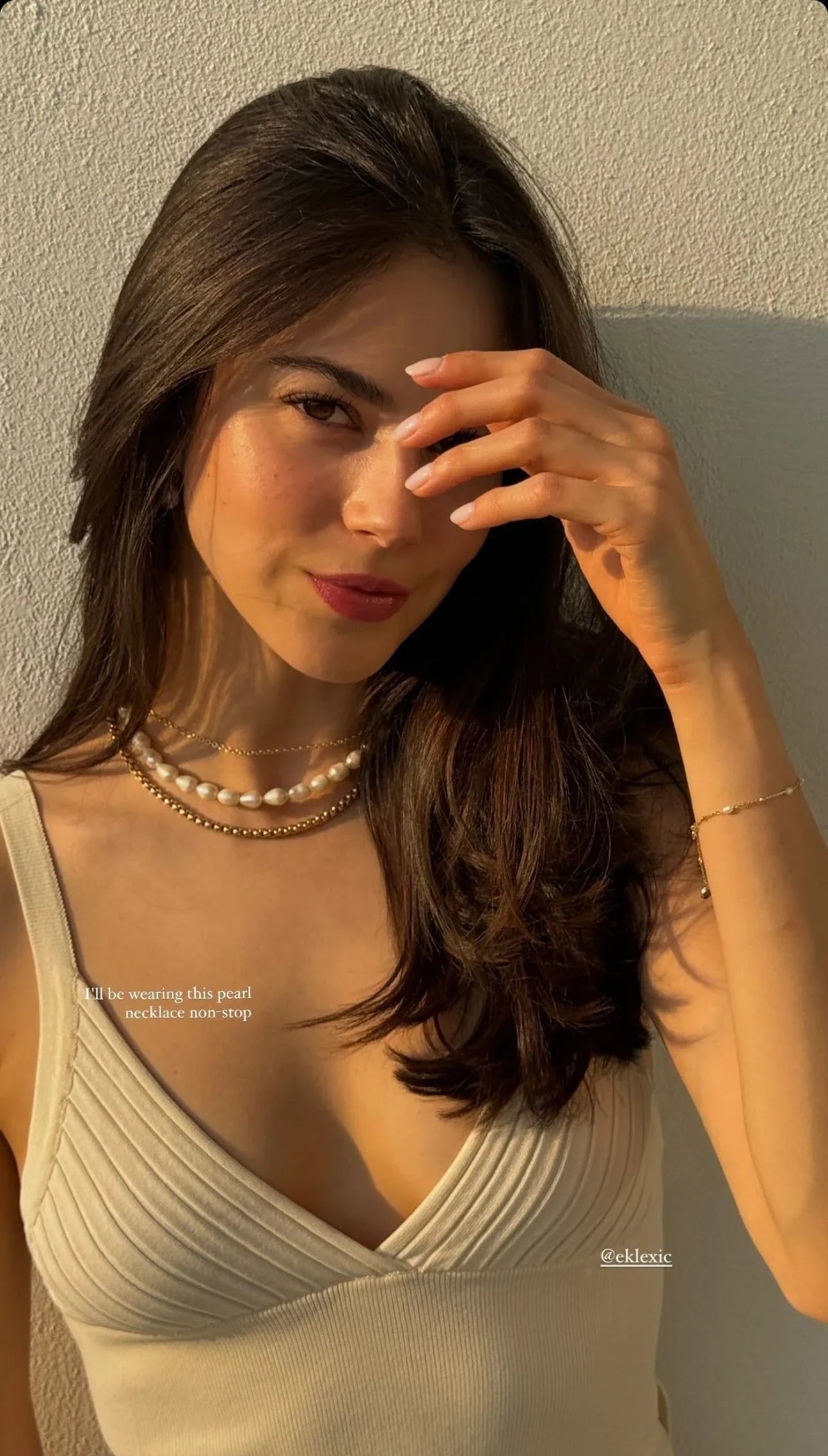 Woman wearing layered Piper Pearl Choker Necklace for a trendy jewelry look