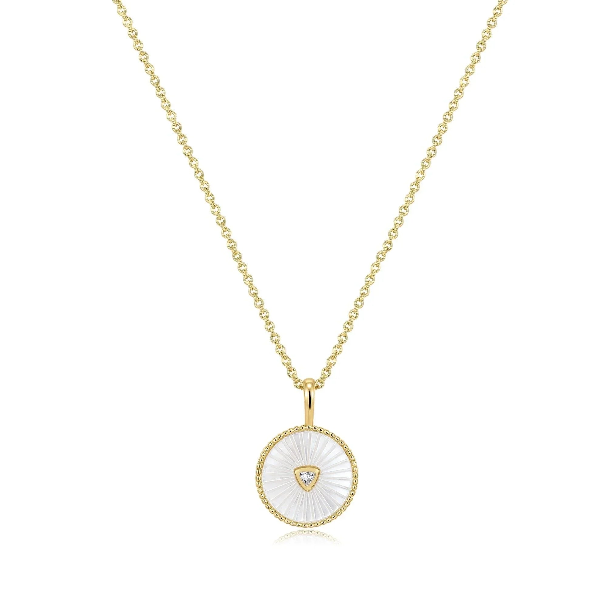 Gold necklace with a Mother Of Pearl pendant and a sparkling CZ stone for that dainty vibe