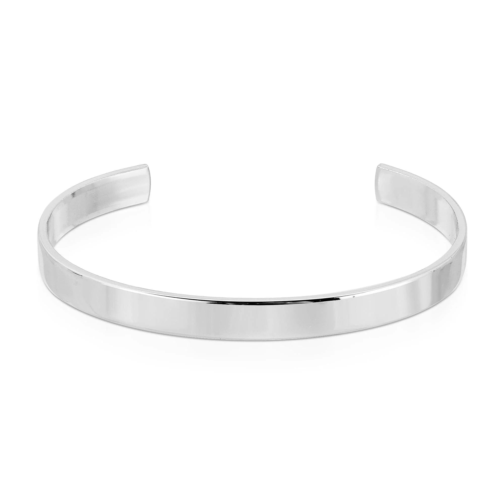 Silver cuff bracelet displayed on Men’s 1/4 Inch Brass Cuff, a recycled brass cuff accessory