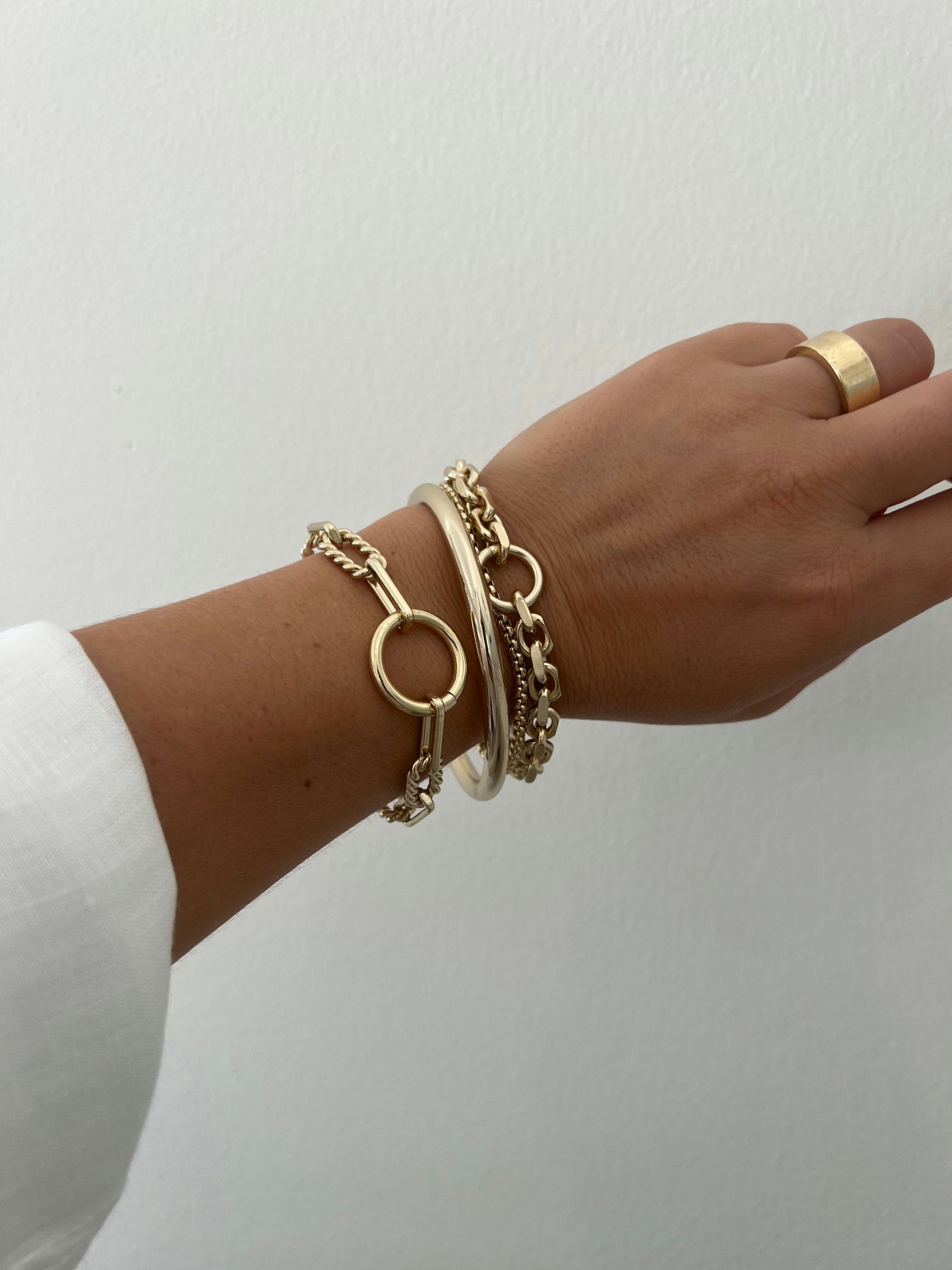 Gold-toned Eliza Bracelet with twisted link design made from recycled brass