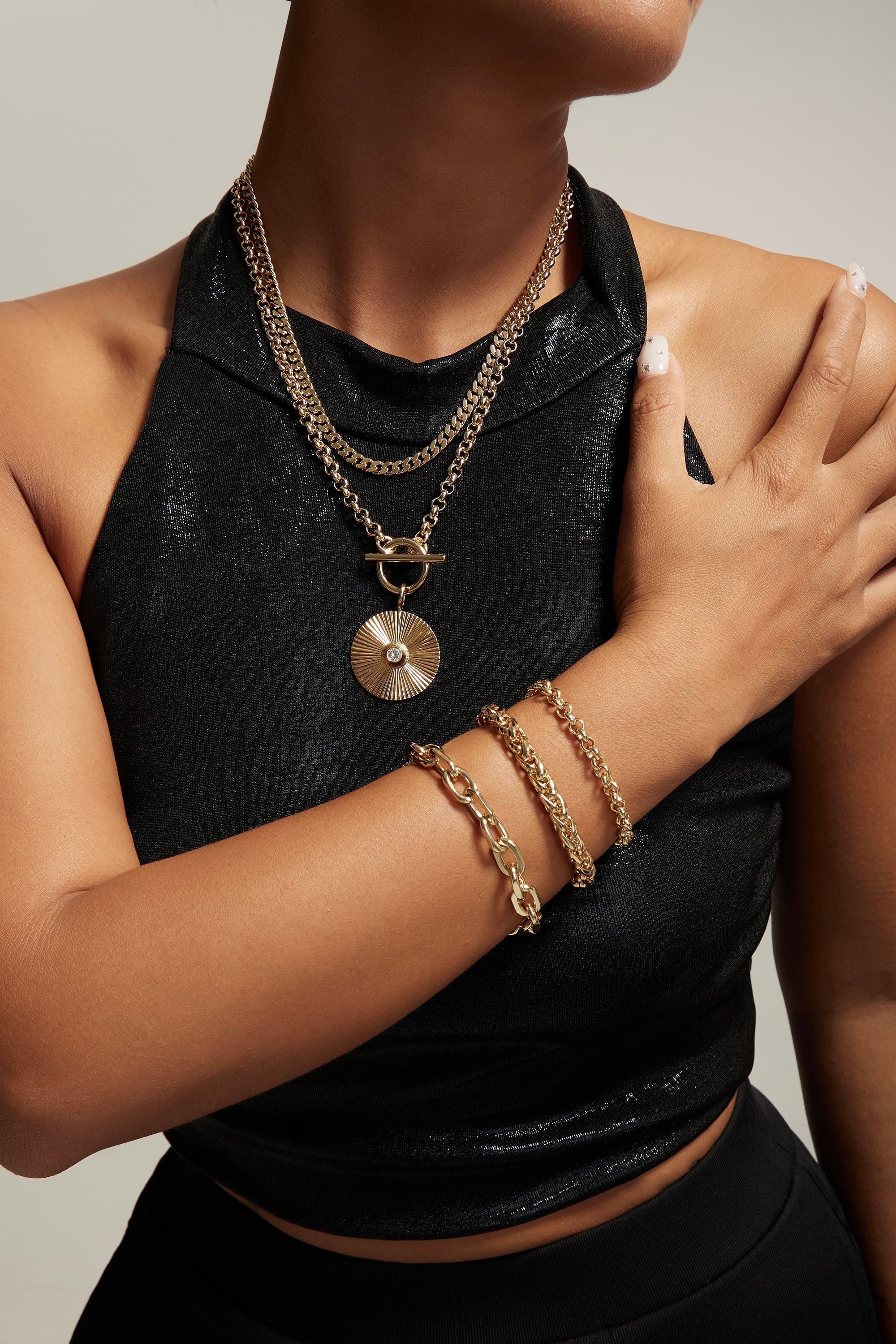 Gold-toned Esmé Bracelet featuring a 7mm wide clasp and Chopin chain design