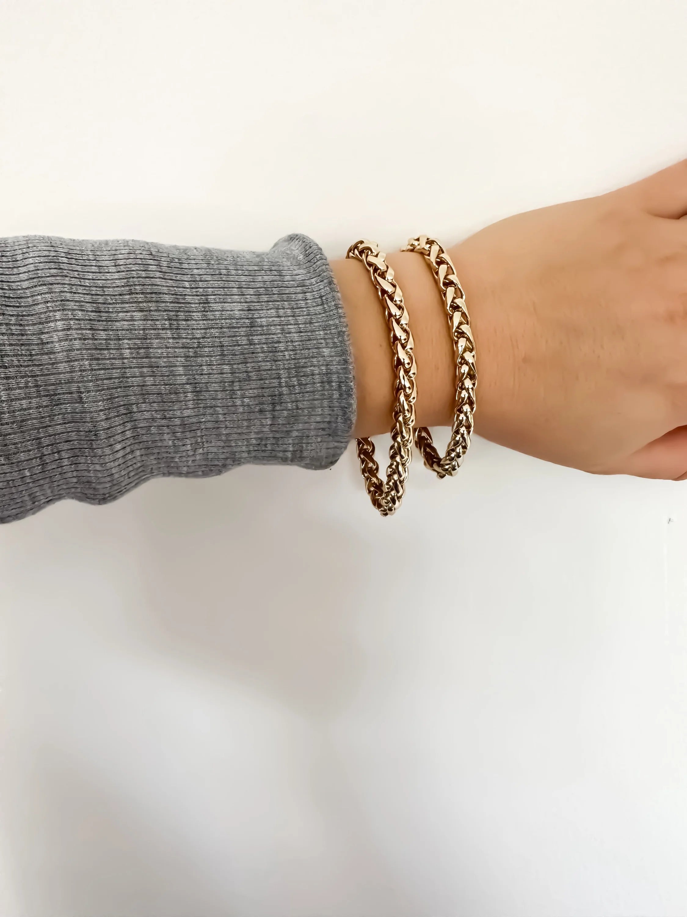Esmé Bracelet featuring two gold braided chains with a 7mm wide clasp