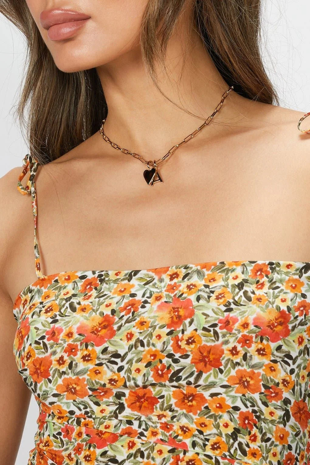 Floral print dress featuring essential letter charms in recycled brass plated with 15mm letters