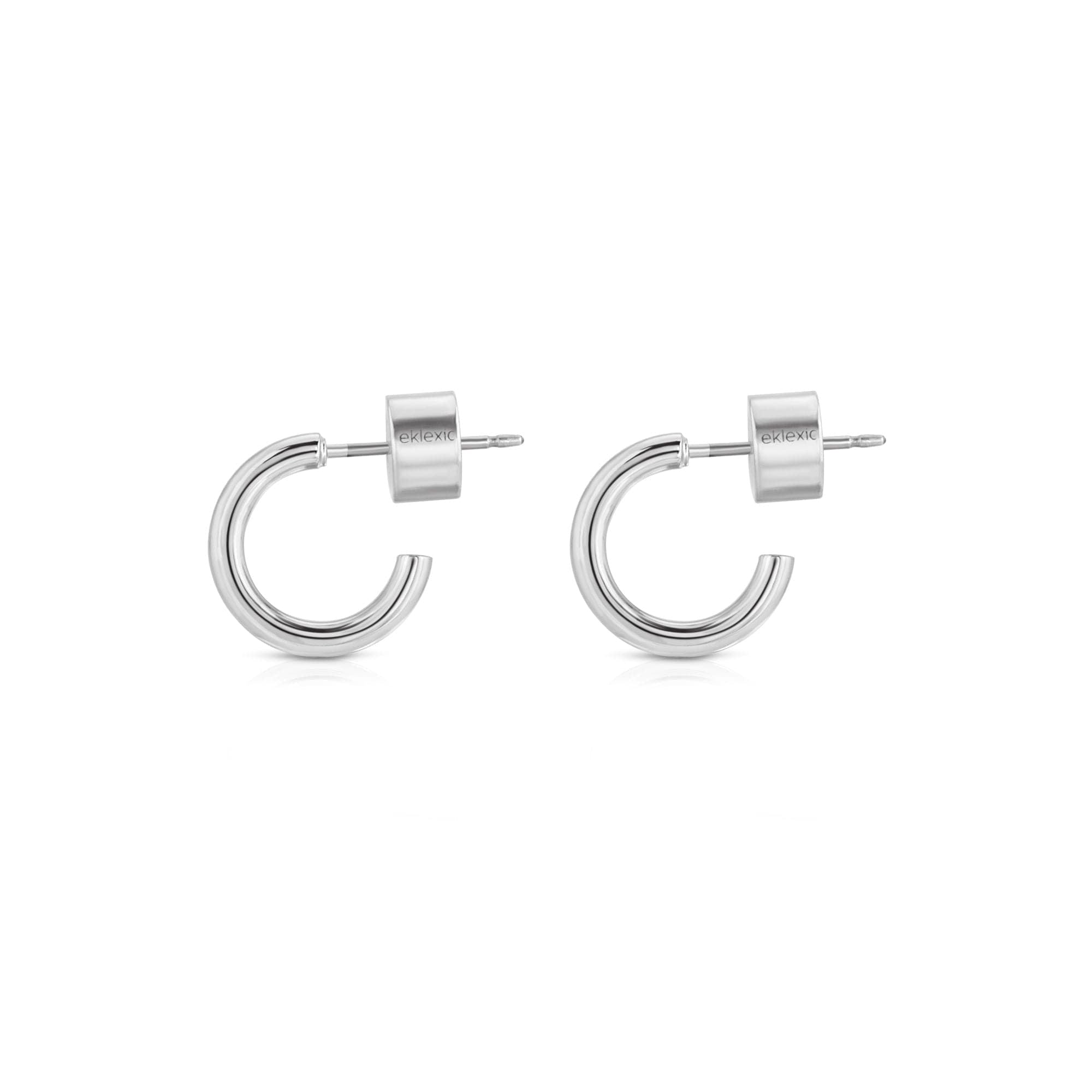 Pair of Jeanne Huggie Hoops in silver, crafted from recycled brass and hypoallergenic surgical steel