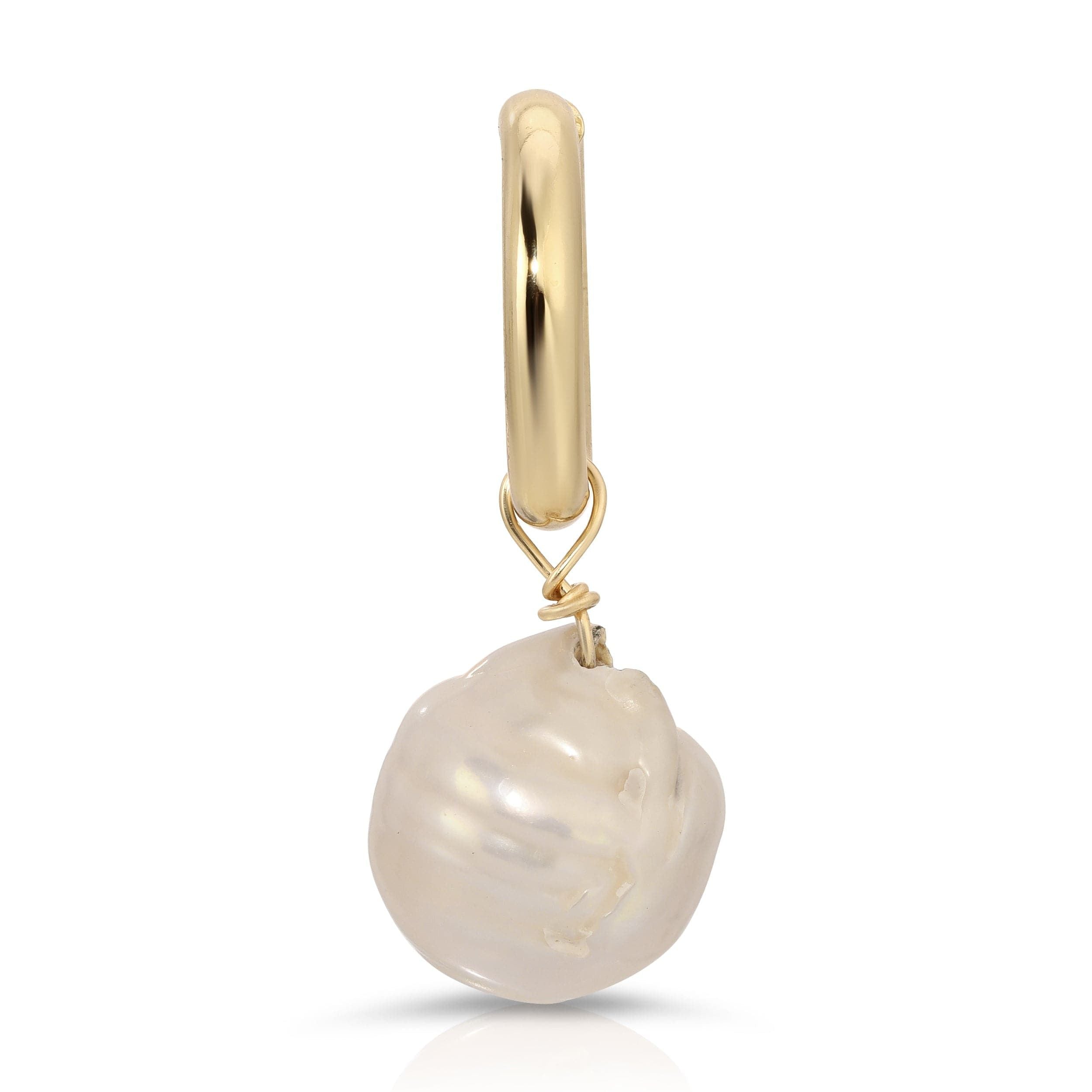 Gold hoop earring featuring a Large Baroque Pearl Pendant on a recycled brass ring