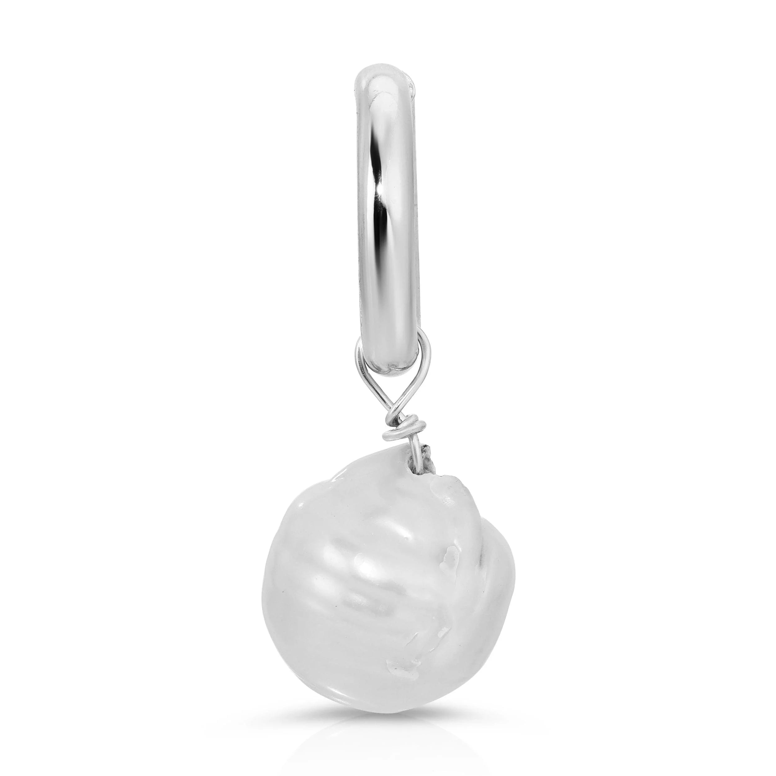 Silver hoop earring with large baroque pearl pendant showcasing a brass ring baroque style