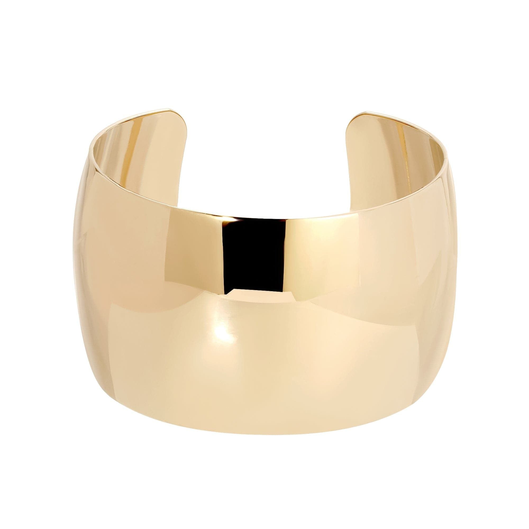 Shiny gold cuff bracelet featuring a large domed cuff and high polish finish in 14k gold