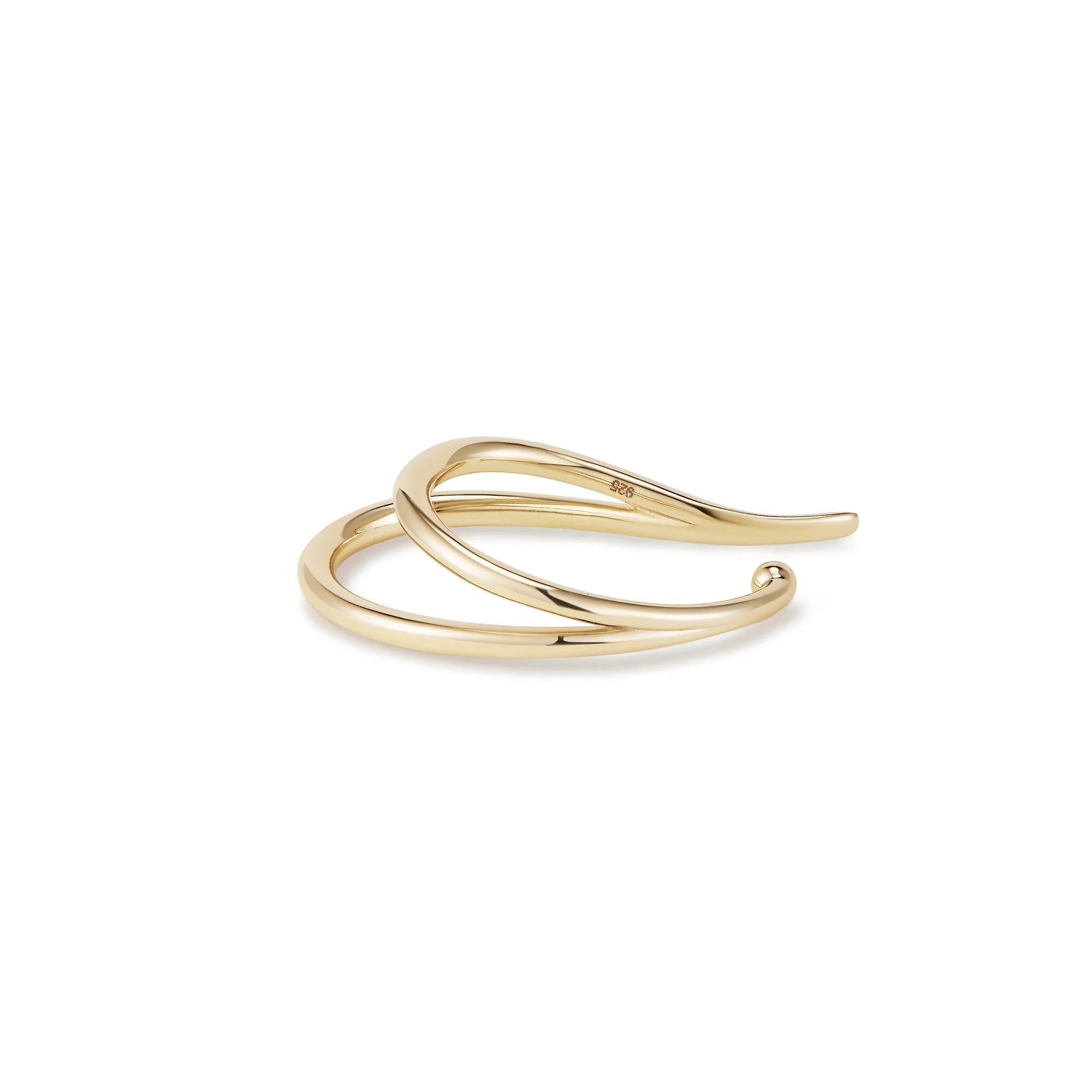 Gold-colored double-band ring on large dual ear cuff showcasing sterling silver ear cuff design