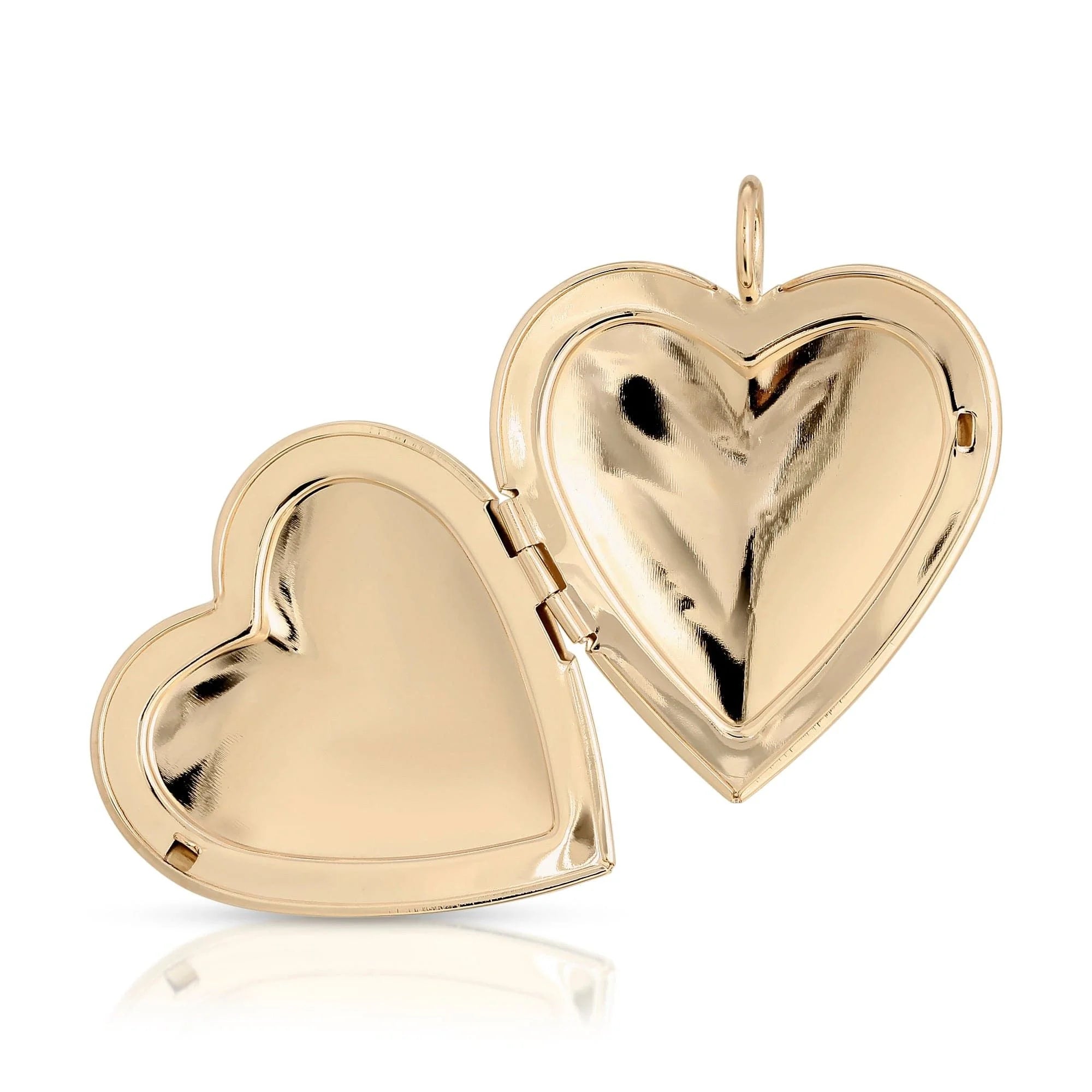 Open gold heart locket displayed on Large Hamilton Locket Brass Plated 14k jewelry