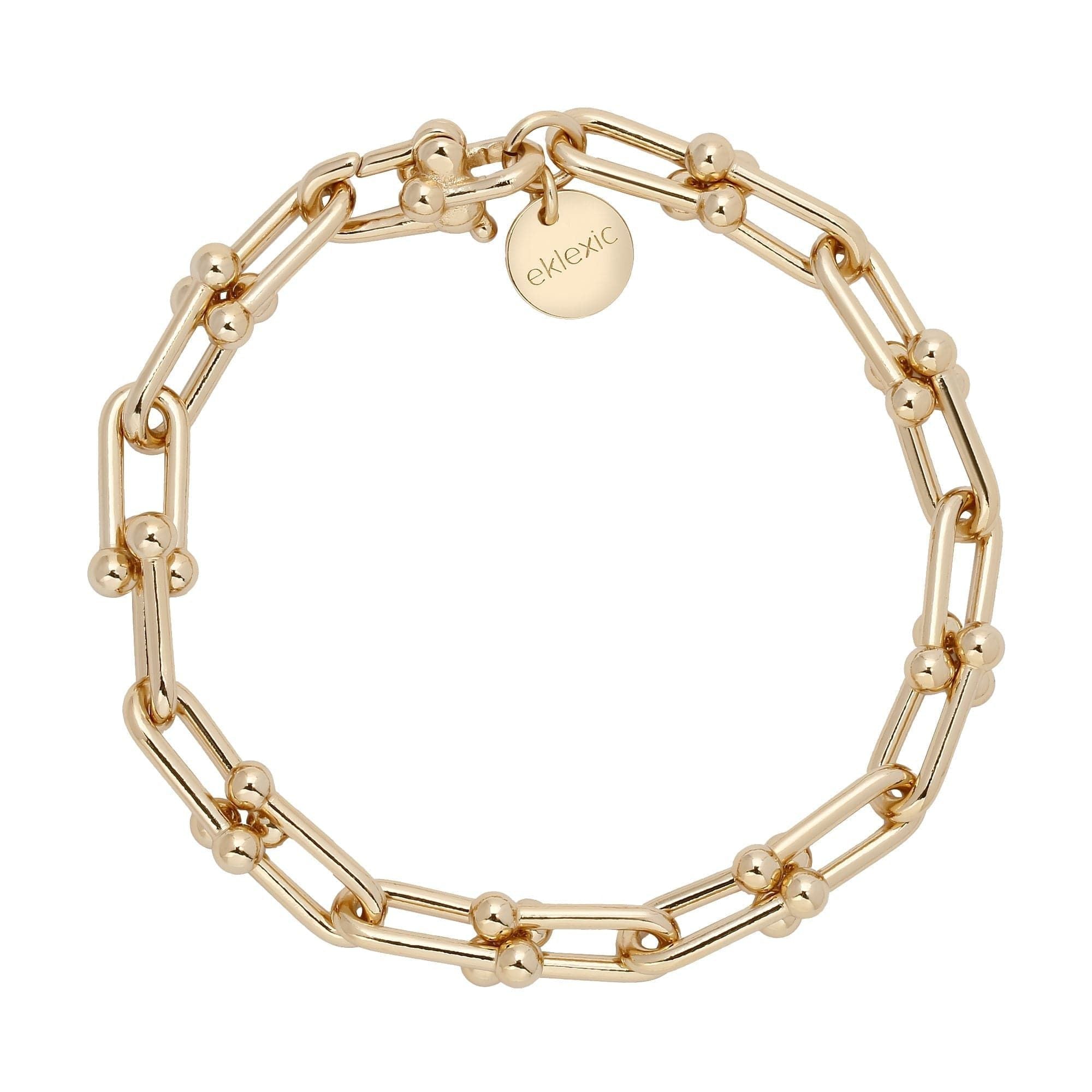 Gold-toned chain link bracelet featuring Margaux Anklet with custom U link design