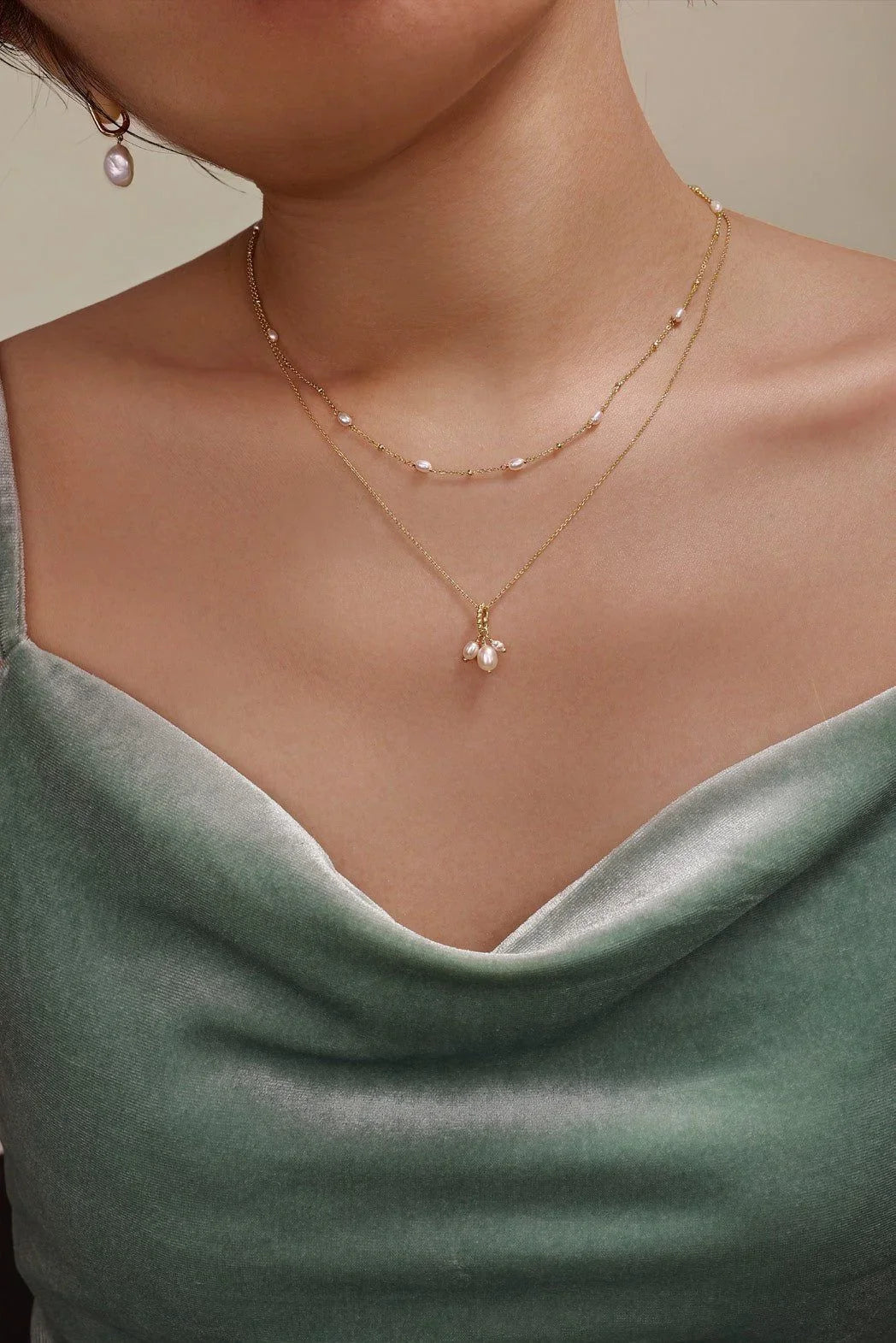 Woman wearing layered Micro Pearl & Bead Necklace looks stylish and elegant