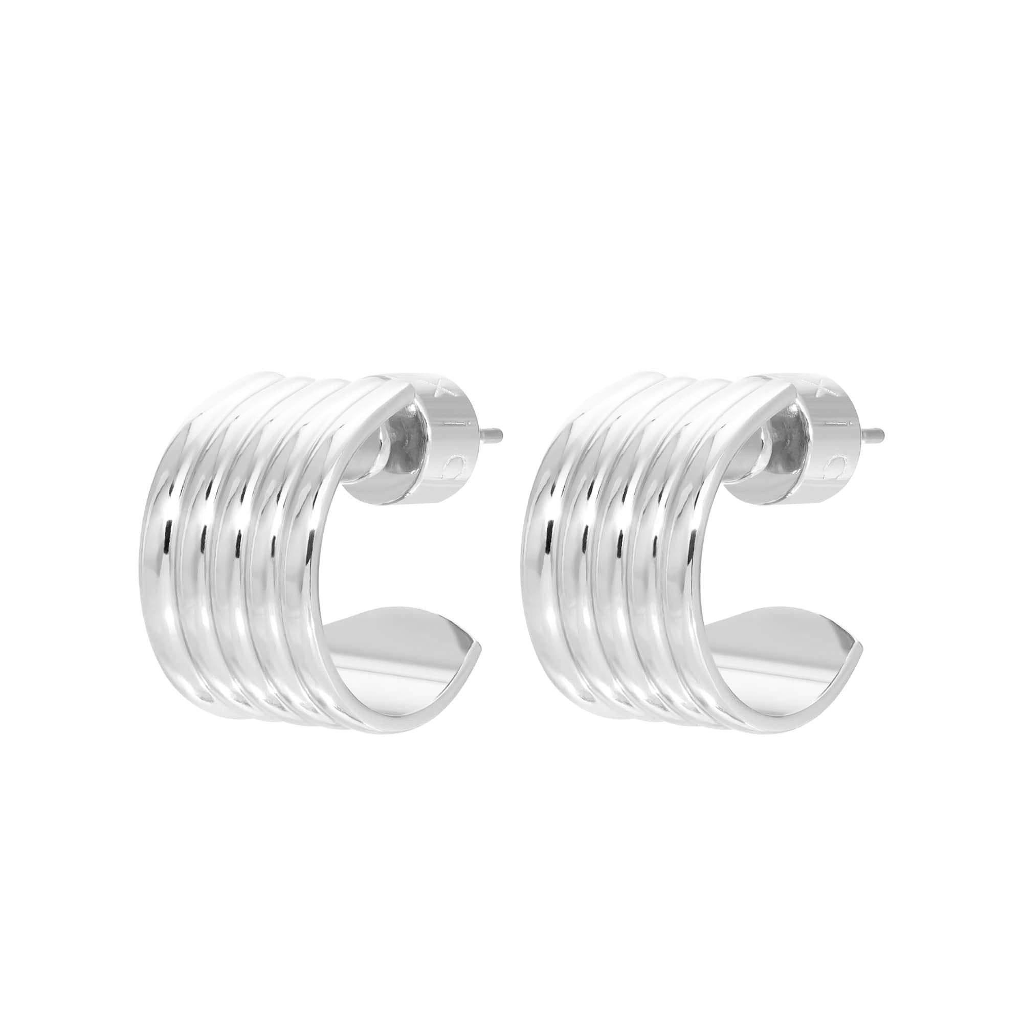 Mini Logan Hoops in silver, showcasing stylish wide flat hoop earrings