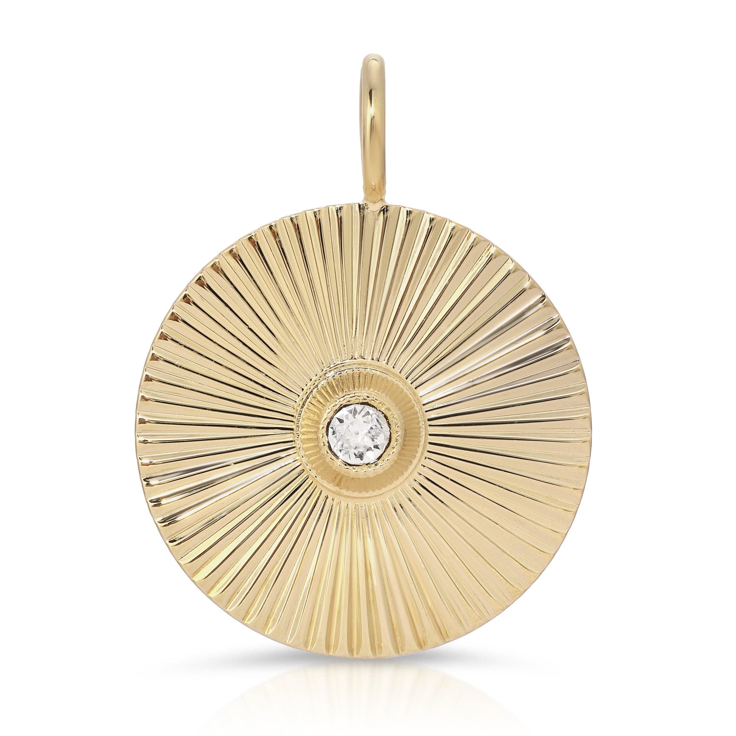 Gold sunburst pendant with diamond on Luciana chain, featuring Swarovski crystal center