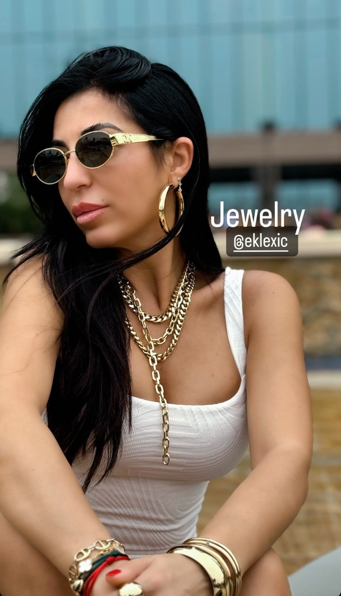 Woman wearing Serenity Necklace with a rounded curb chain fastened and gold jewelry