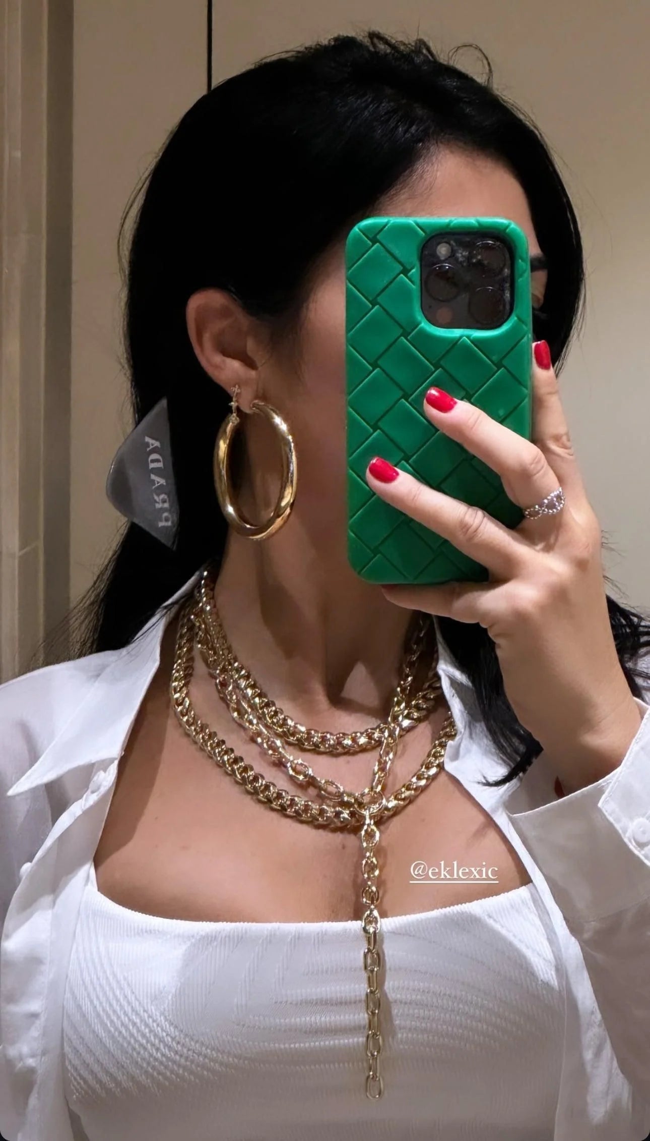 Woman wearing Serenity Necklace with a gold curb chain fastened and clear protective coating