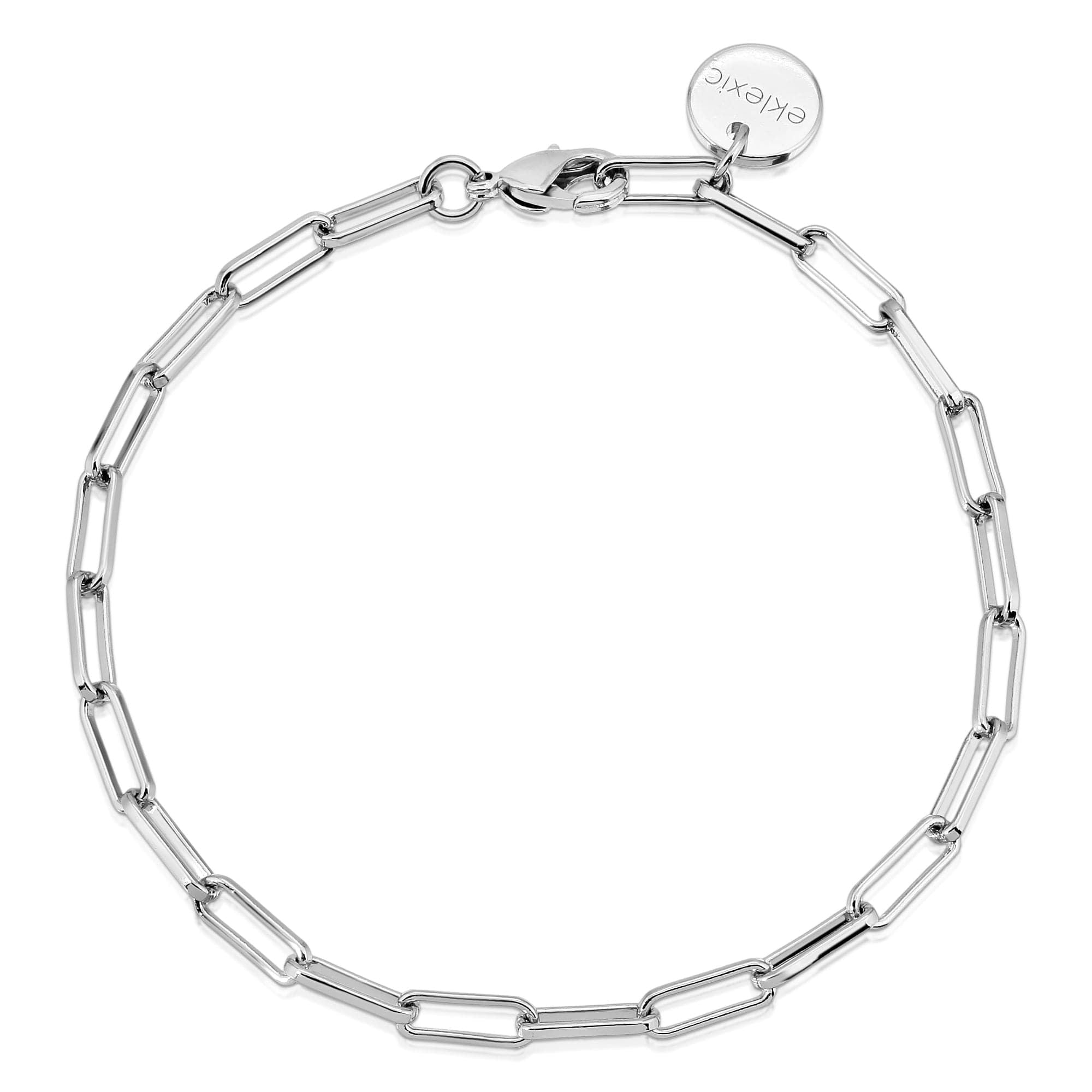 Silver elongated link chain anklet featuring a stylish brass paper clip design