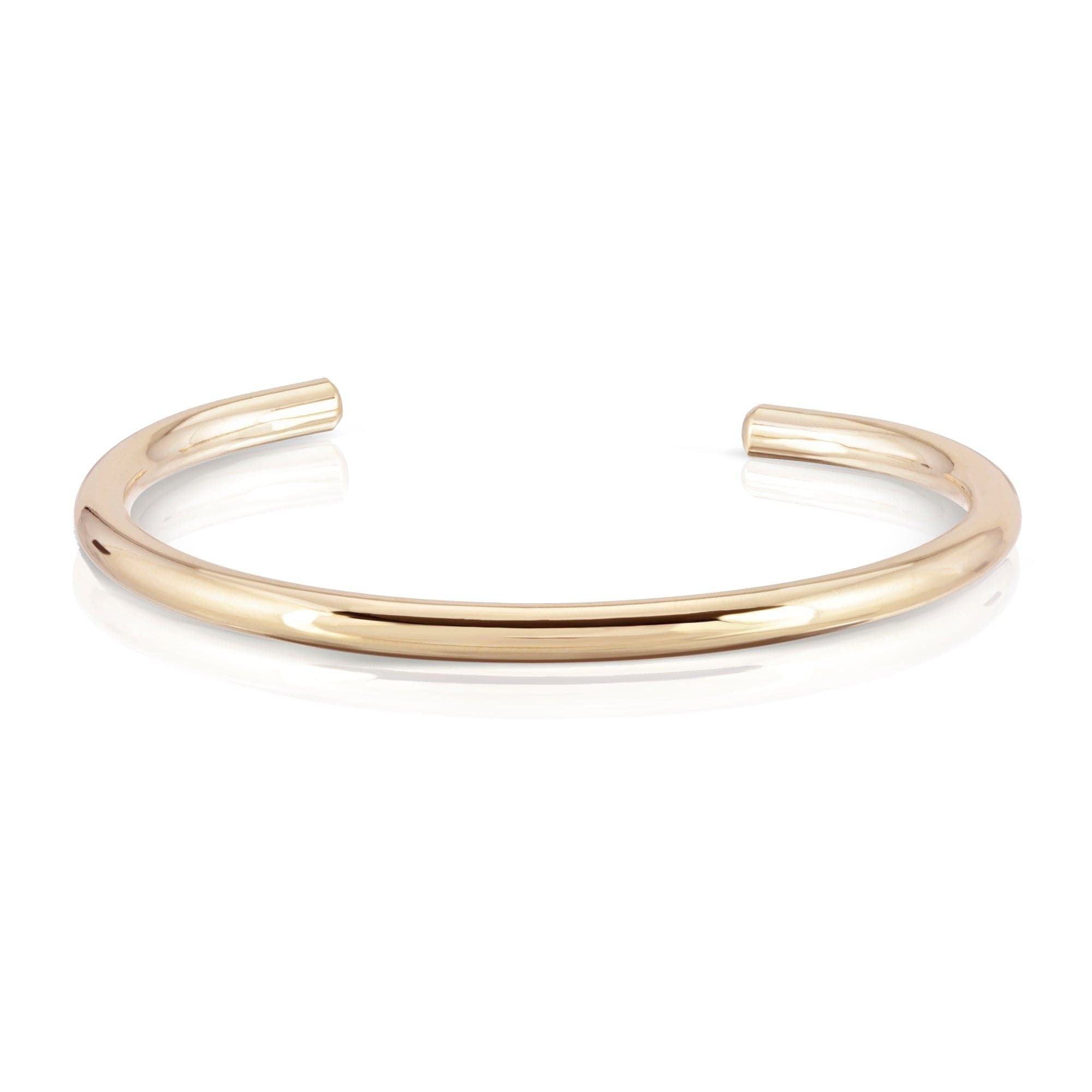 Gold-colored open cuff bracelet made from round recycled brass wire in Simple Round Cuff