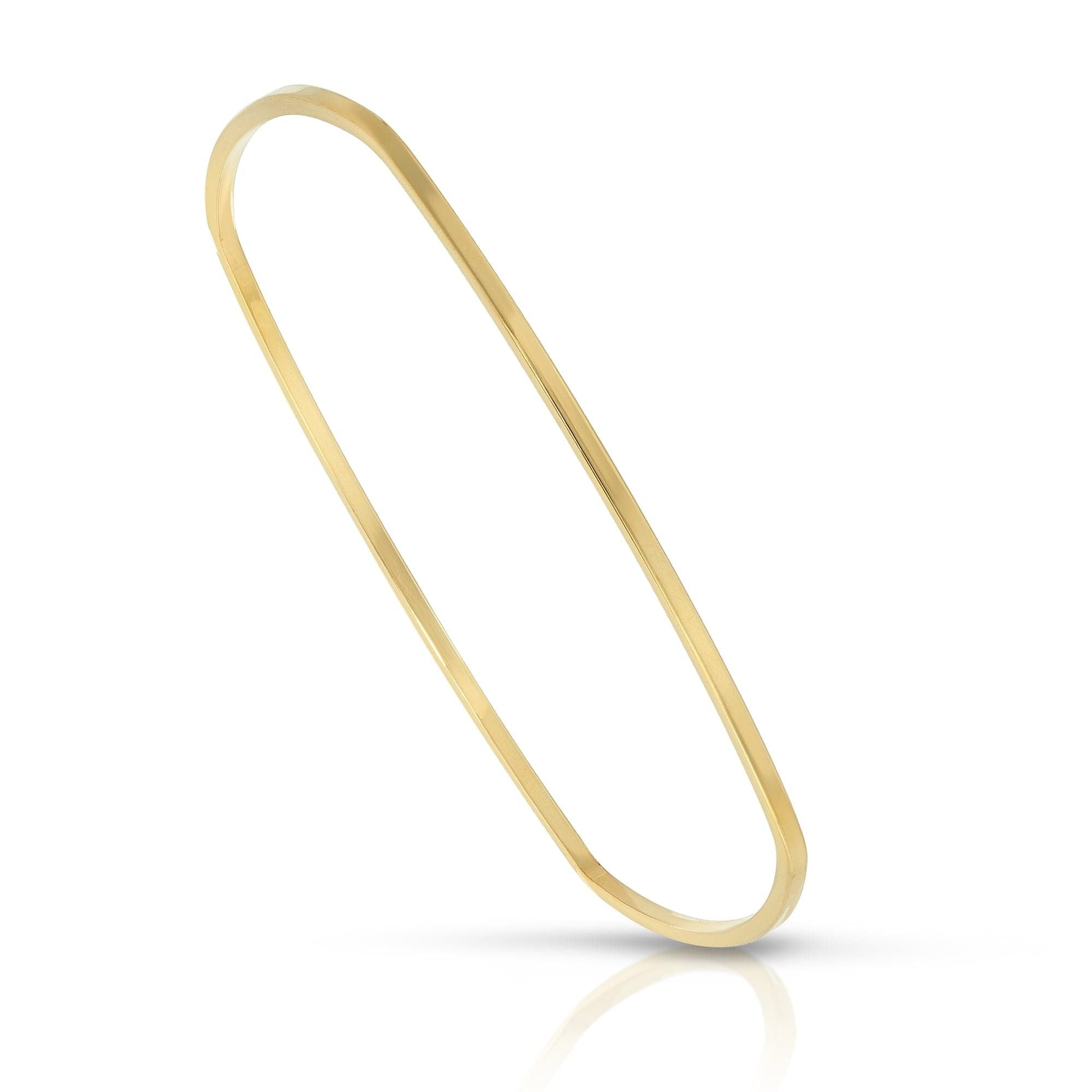 Thin gold bangle showcasing the Skinny Elenor Bangle in 14k Yellow Gold Rhodium finish