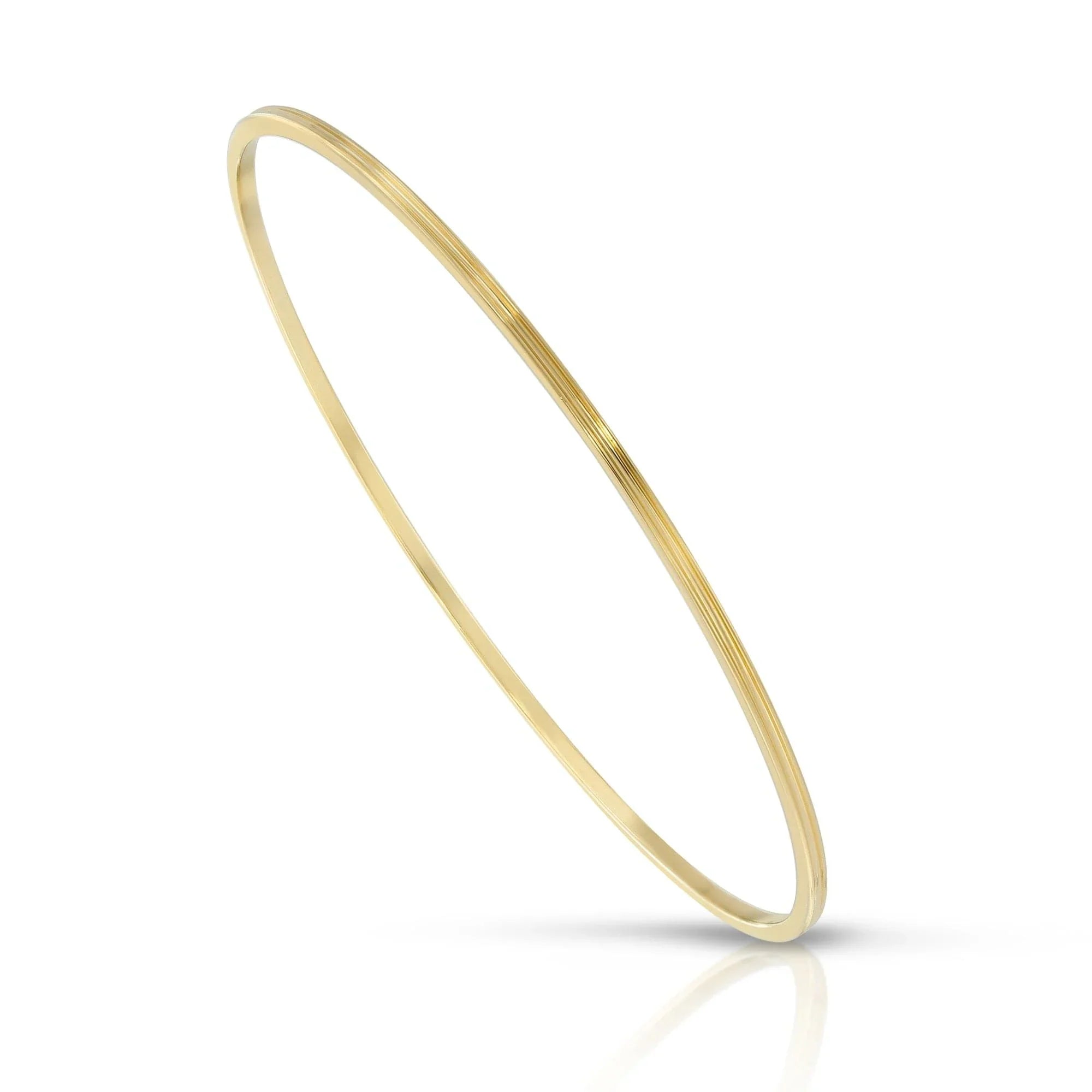 Thin gold bangle from the Skinny Lily Bangle collection perfect for your wrist